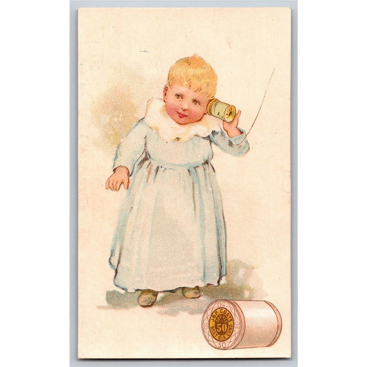 Baby Holds Spool to Ear Victorian Trade Card - JP Coats Thread