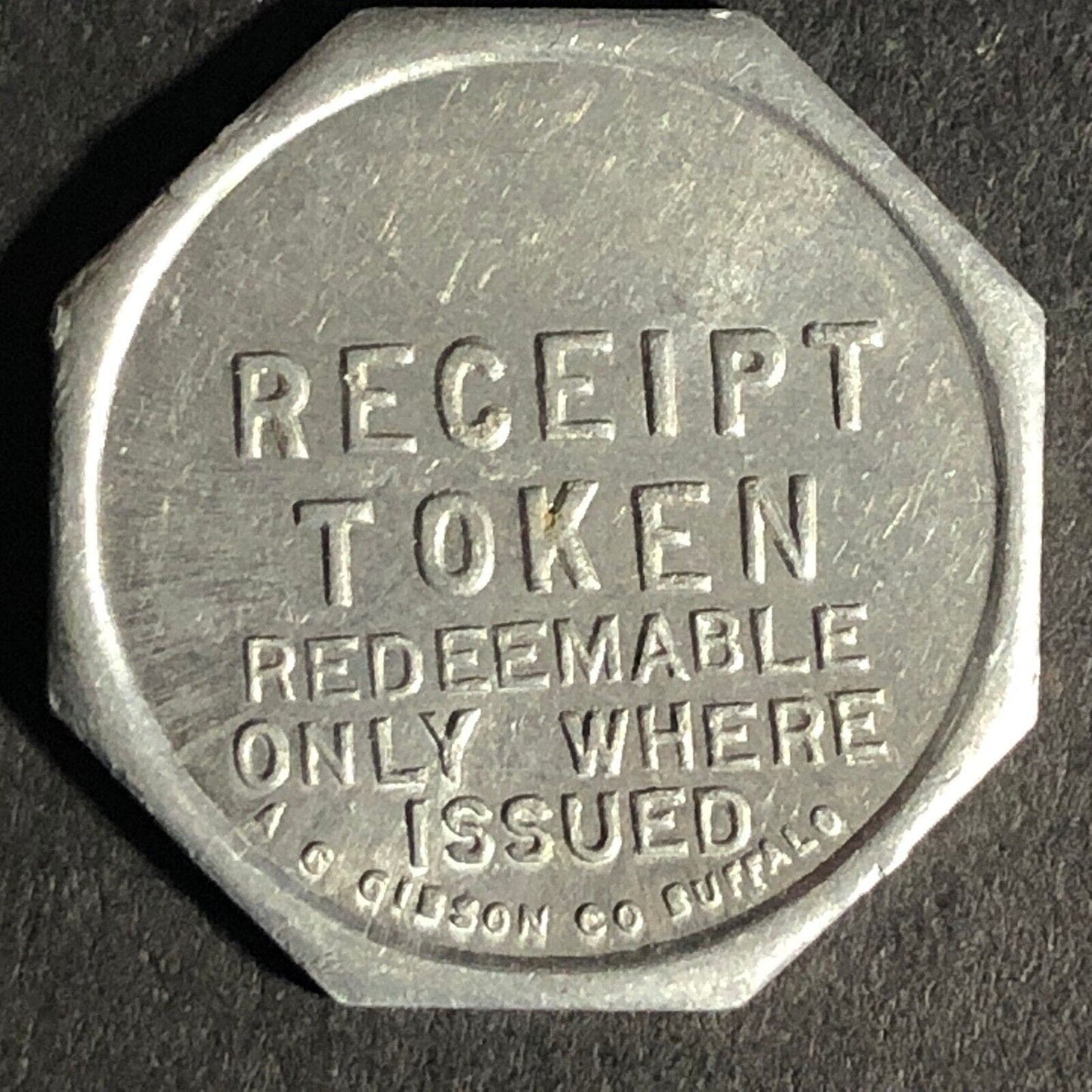 A.C. Gibson Co. 2300 Genesee St. Buffalo Alum. Receipt Token Octagon 22.59mm