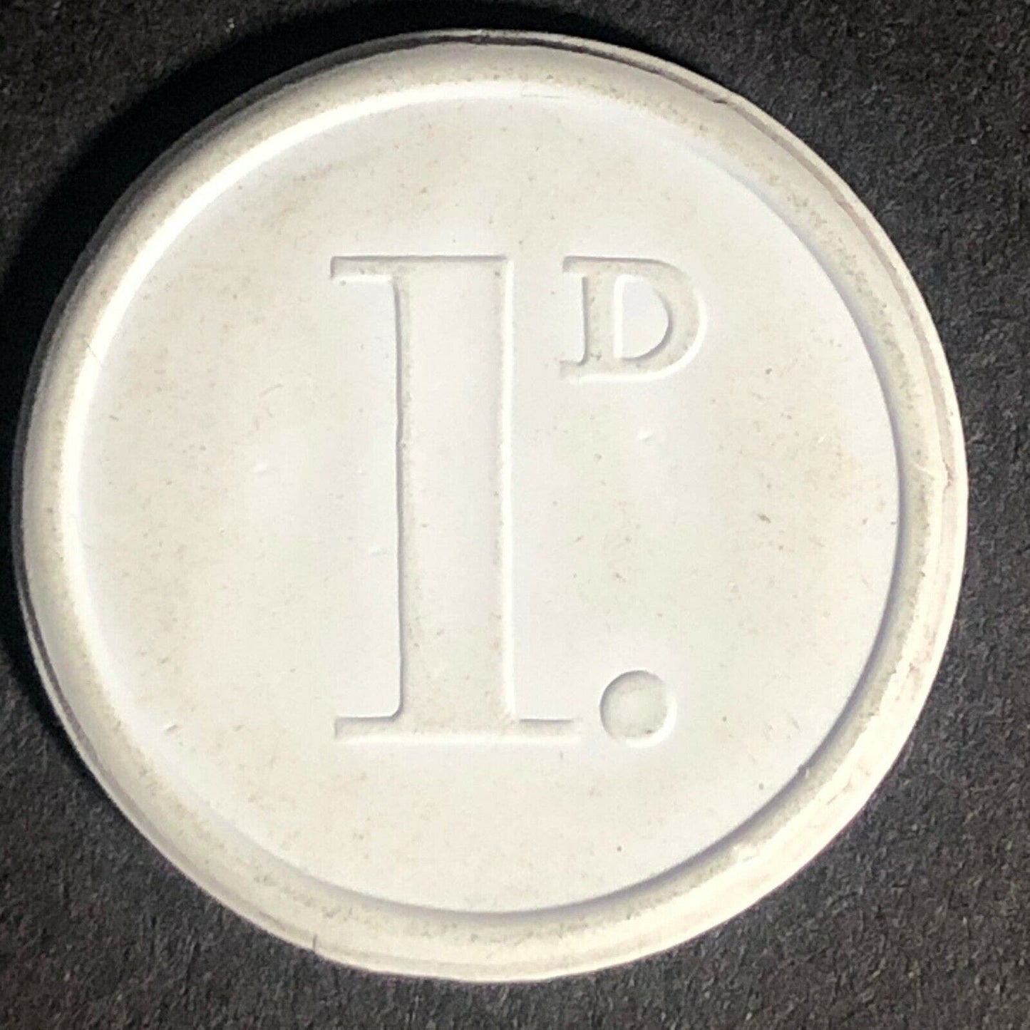 Leeds City Transport England Plastic Transit Token White 1D 21mm c50's-60's