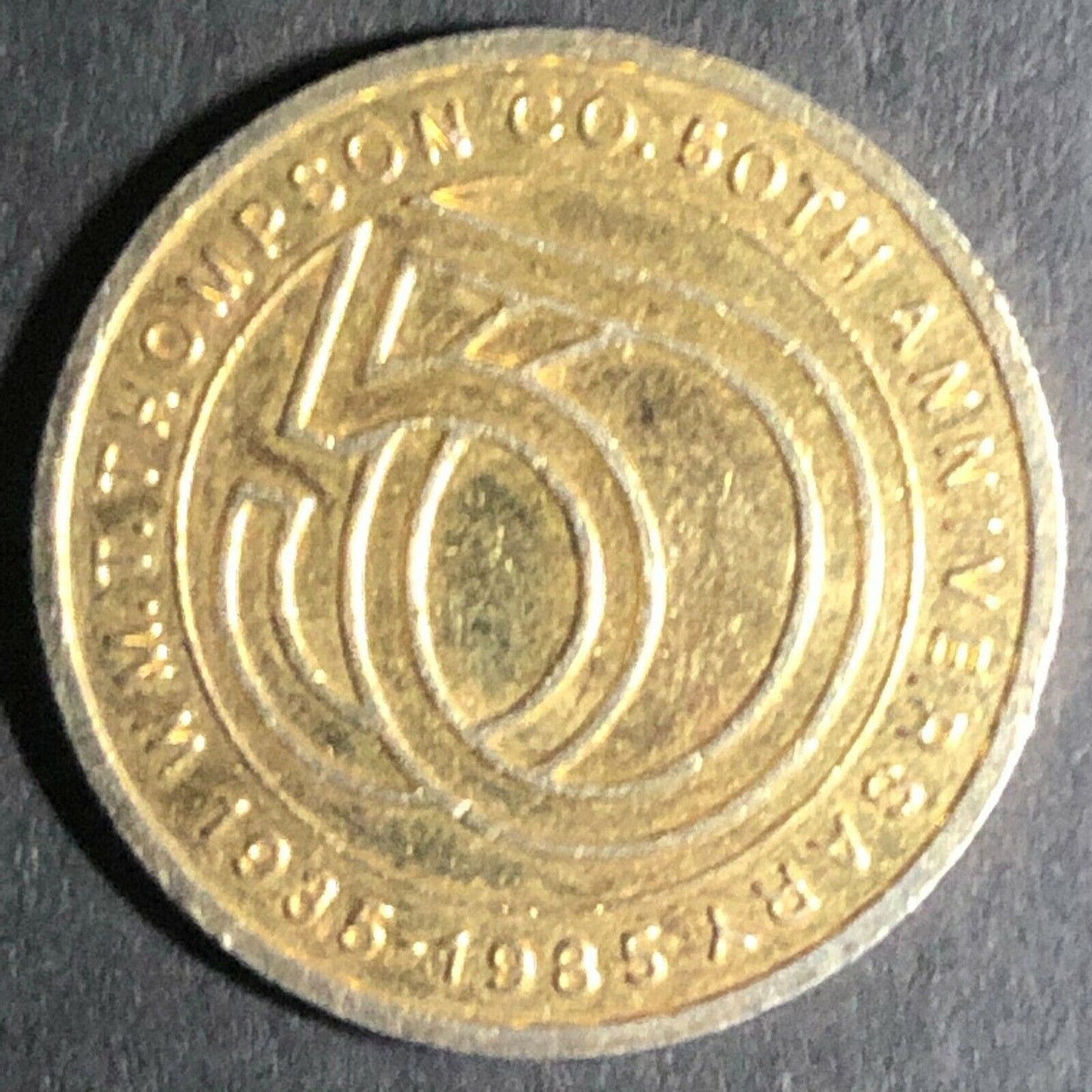 23mm 1985 "Wm. T. Thompson" (Vitamins) 50c off Reeded Brass Token - Fauver Coll.