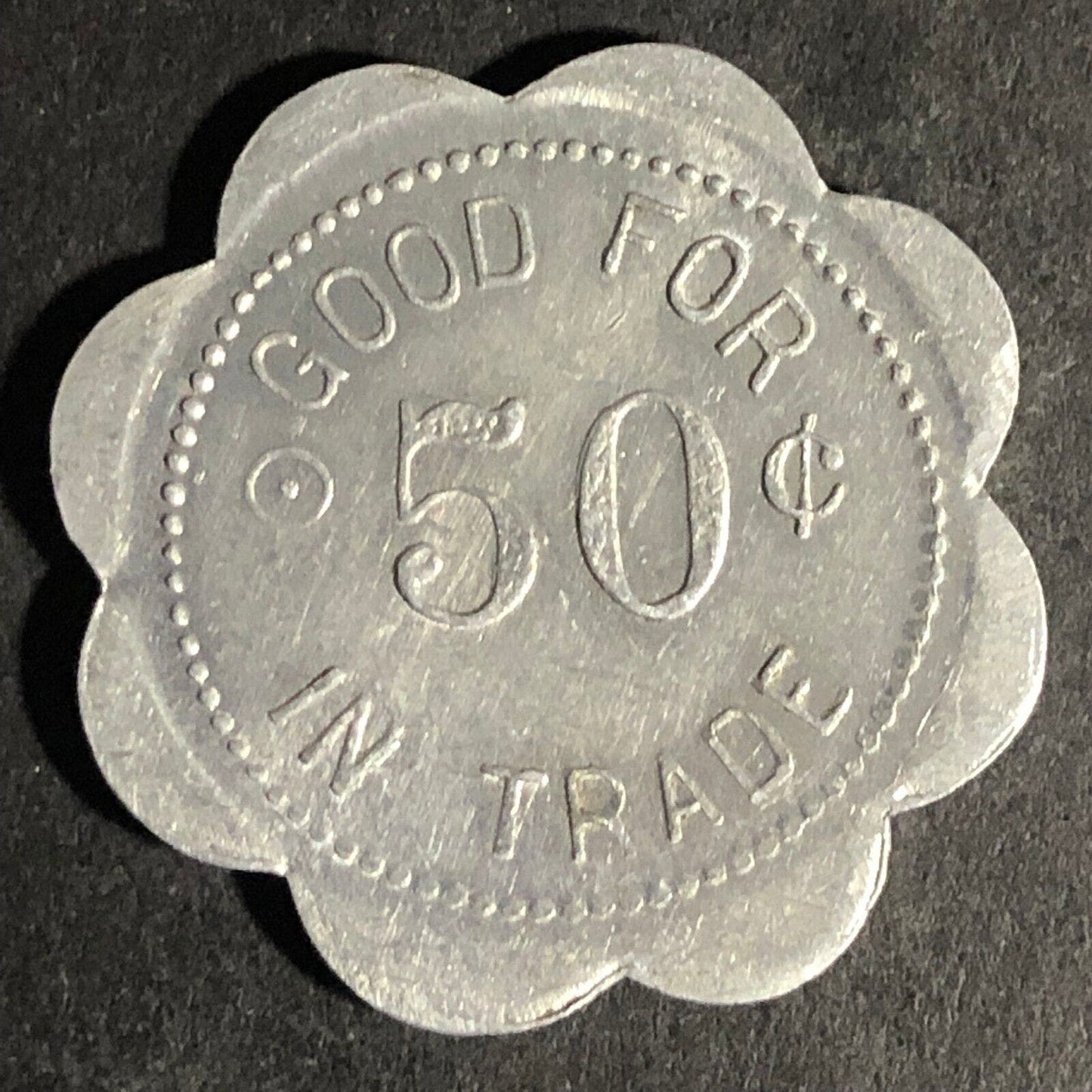 John Krier General Mdse. Iona, Minn G/F 50c Alum Scalloped Token 29mm Scarce