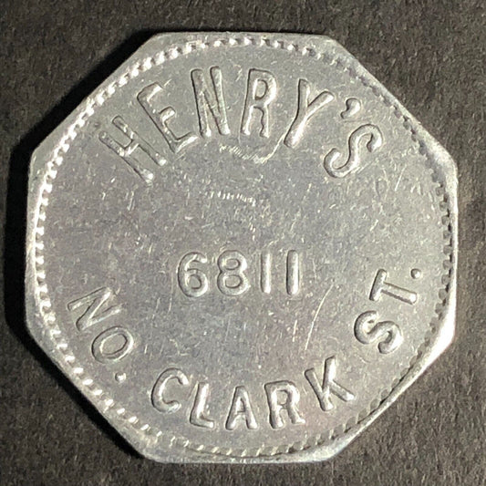 Henry's 6811 No. Clark St (Chicago) Alum G/F 5c Trade Token Hexagon 23mm