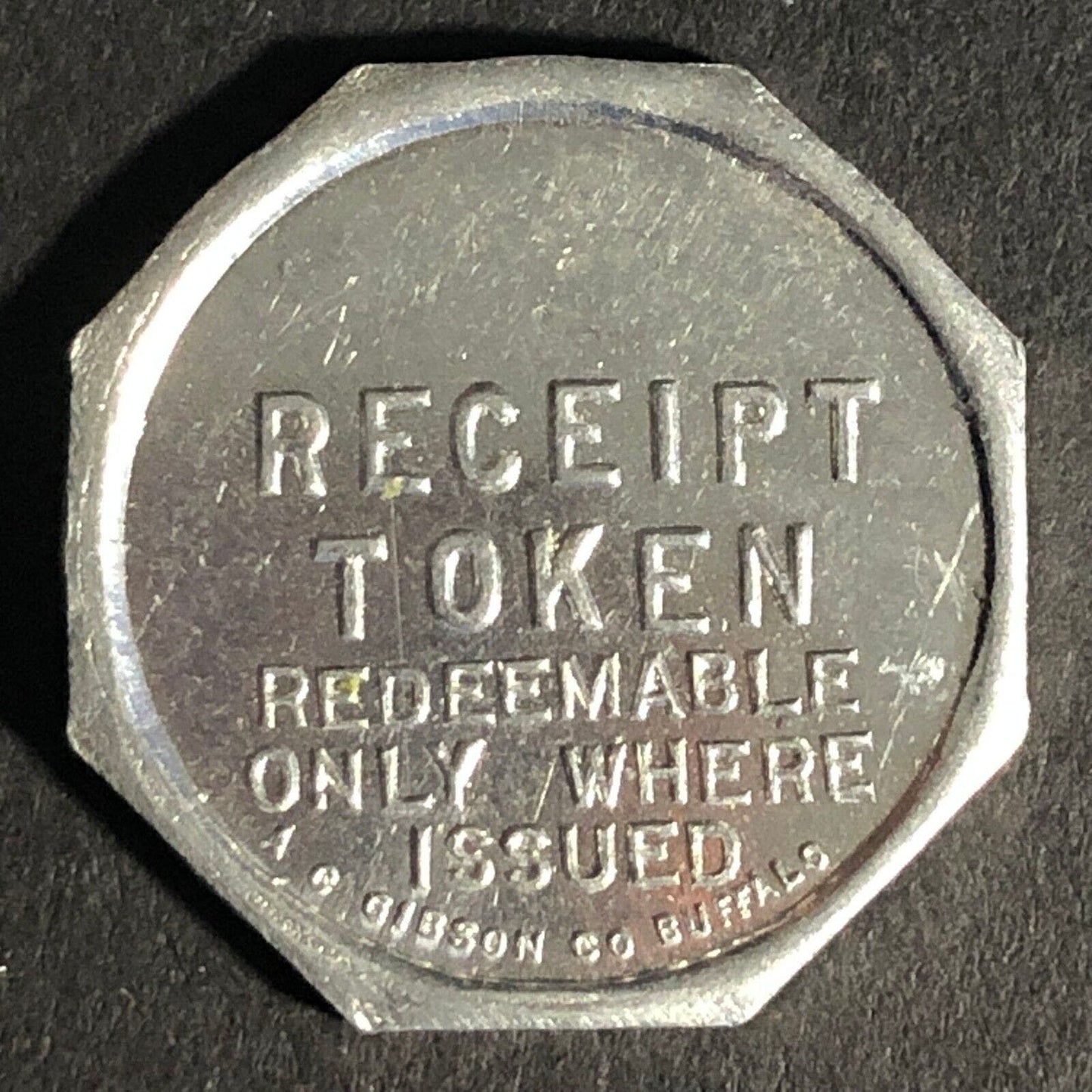 A.C. Gibson Co. 2300 Genesee St. Buffalo Alum. Receipt Token Octagon 22.73mm
