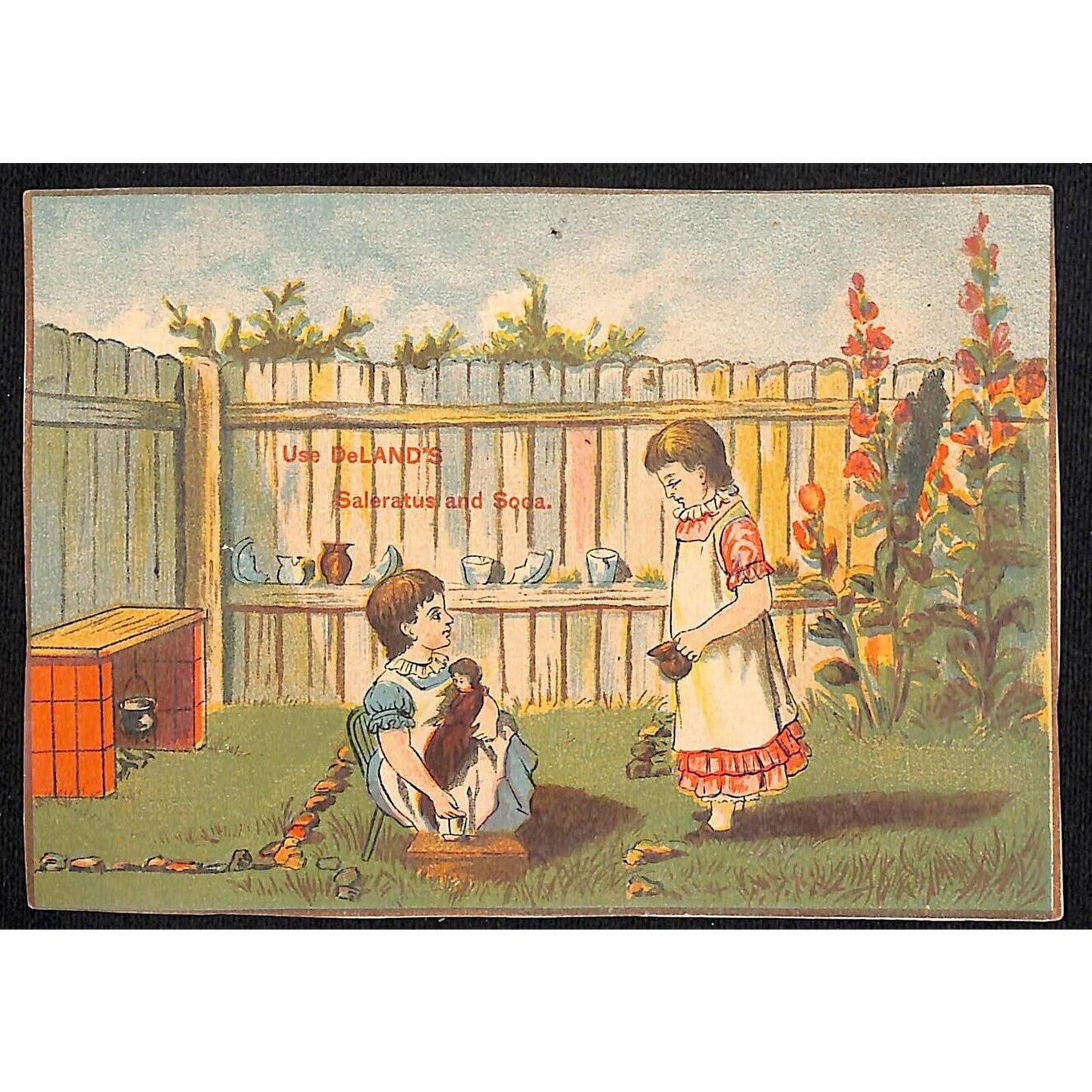 Deland's Saleratus and Soda Victorian Trade Card w/ Girls Tea & Doll in the Yard