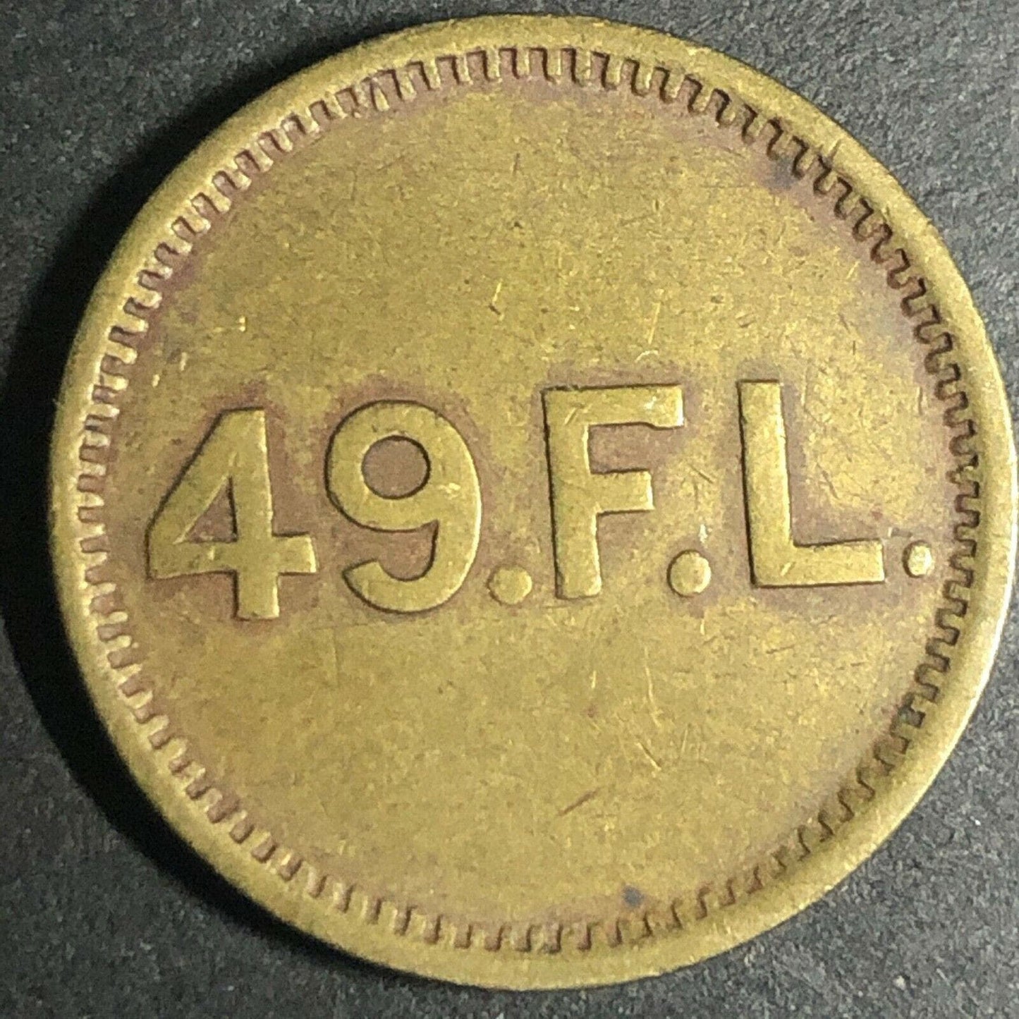 Brass 21.30mm British American Novelty Co. "Rock and Play" Token - Fauver Coll.