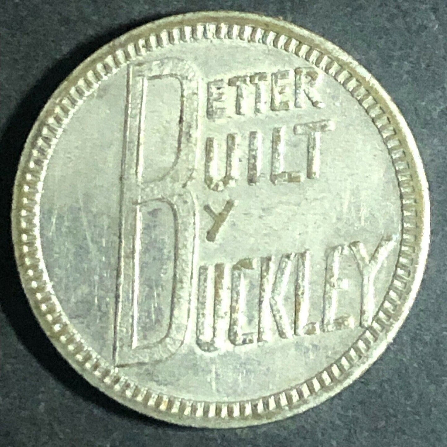 Vintage 20mm Plated Brass "Better Built By Buckley" w/ Large "B" Token