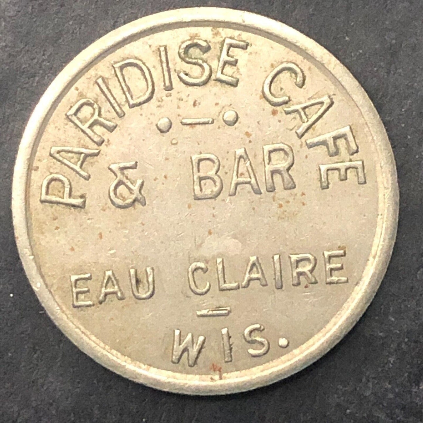 Eau Claire, WIS Paradise Cafe & Bar Trade Token NpBrass 21mm Very Scarce