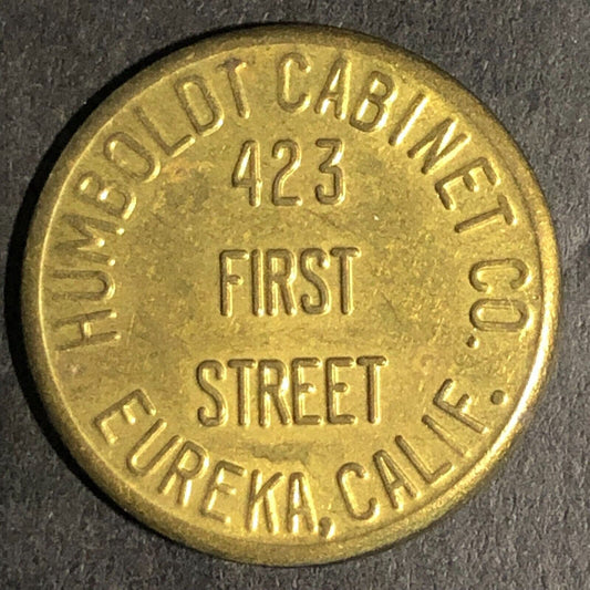 Humboldt Cabinet Co. Eureka, CALIF. Norton E. Steenfott Brass Trade Token 23mm