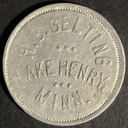 H.B Gelting - Lake Henry, Minn. G/F 25c In Trade Aluminum Token 26mm