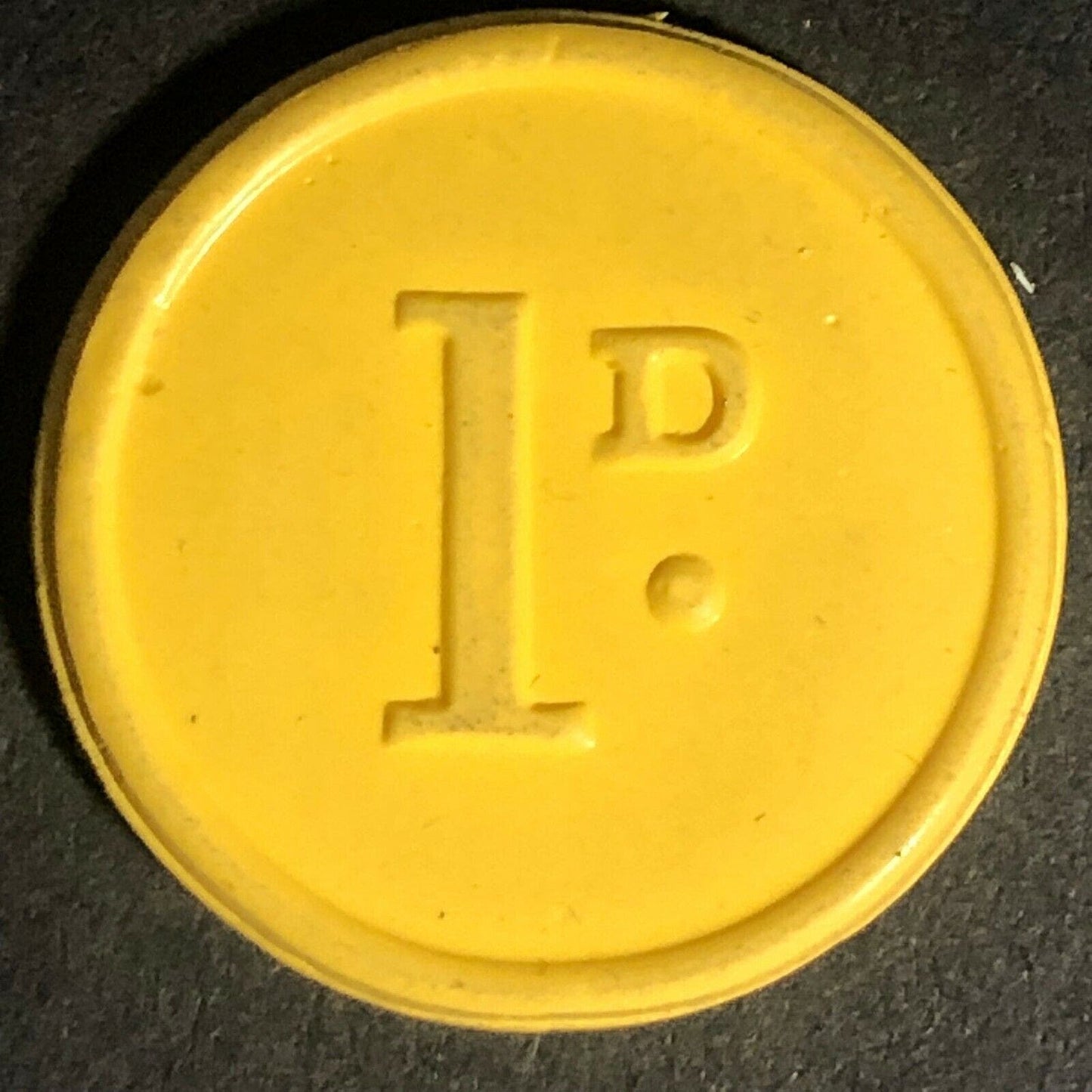 Huddersfield Transport England Plastic Token Yellow 1D 23mm c50's-60's