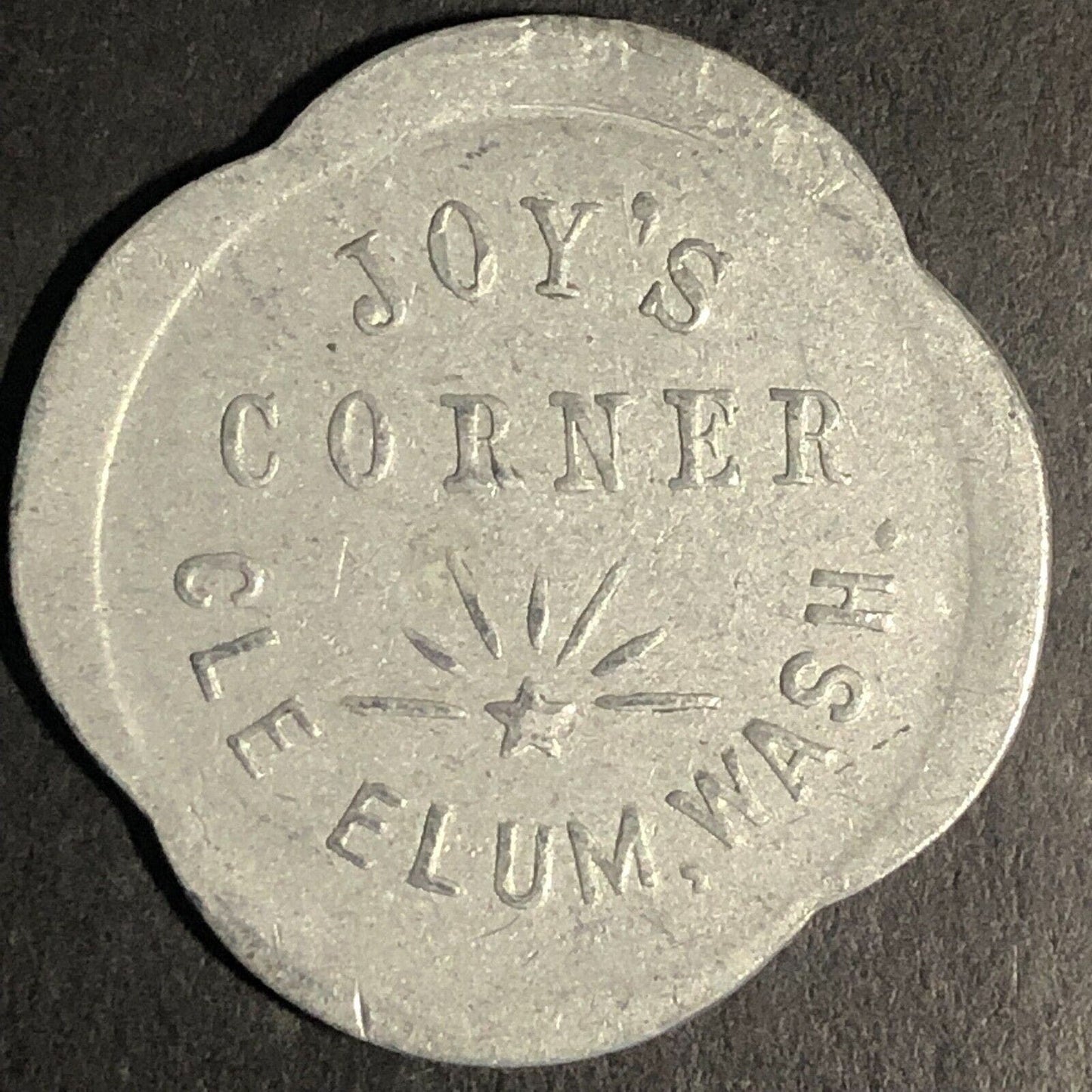 Joy's Corner Cle Elum Washington Scalloped Aluminum G/F 10c Trade Token 28mm