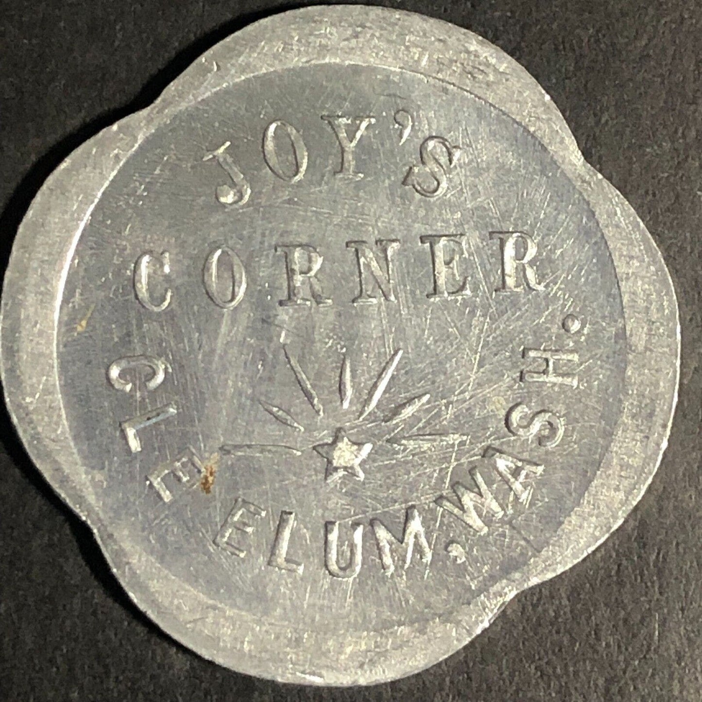 Joy's Corner Cle Elum, Washington Scalloped Aluminum G/F 10c Trade Token - 28mm