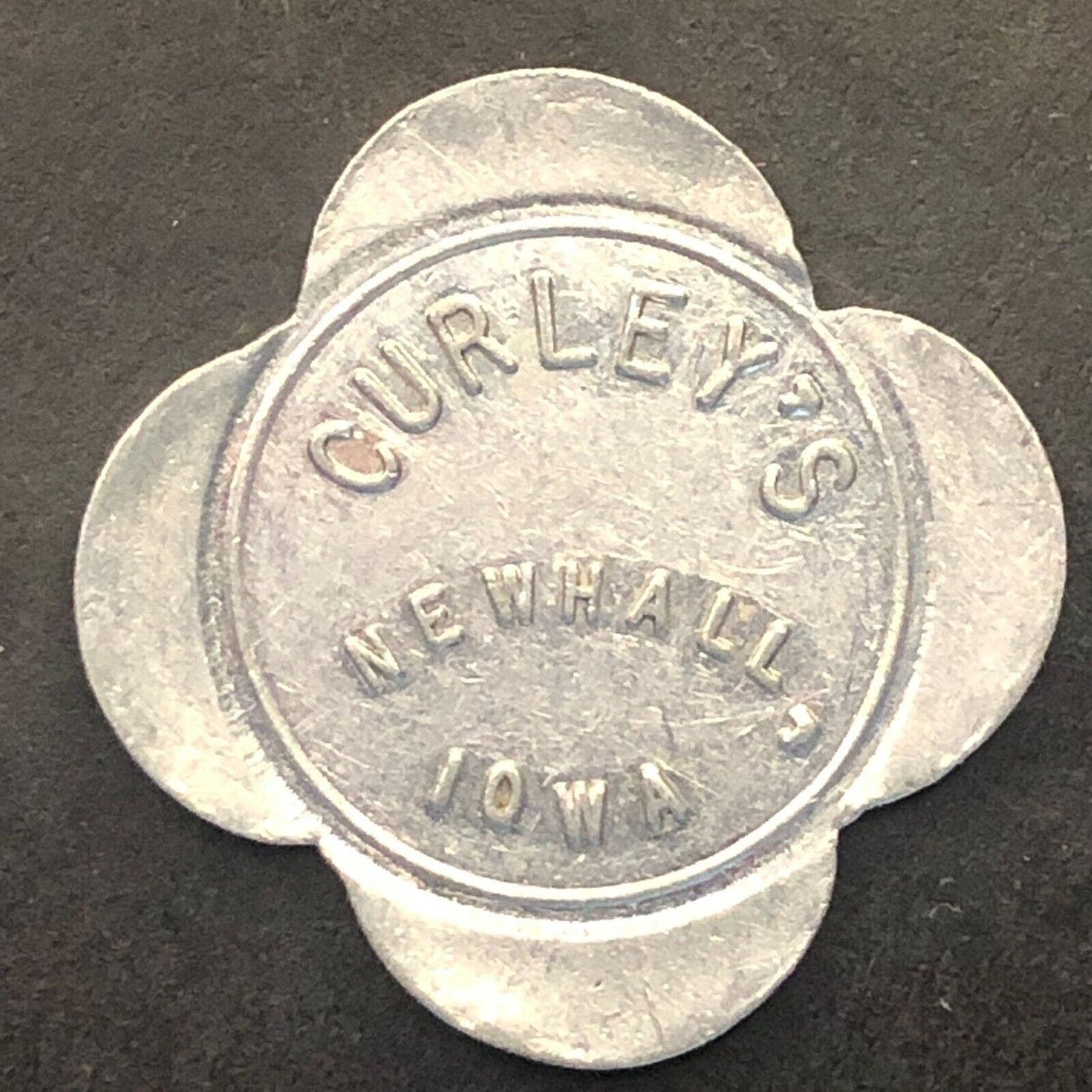 Newhall, Iowa Curley's (Place) G/F/ 10¢ Trade Token Alum. 23.6mm c1920's-30's