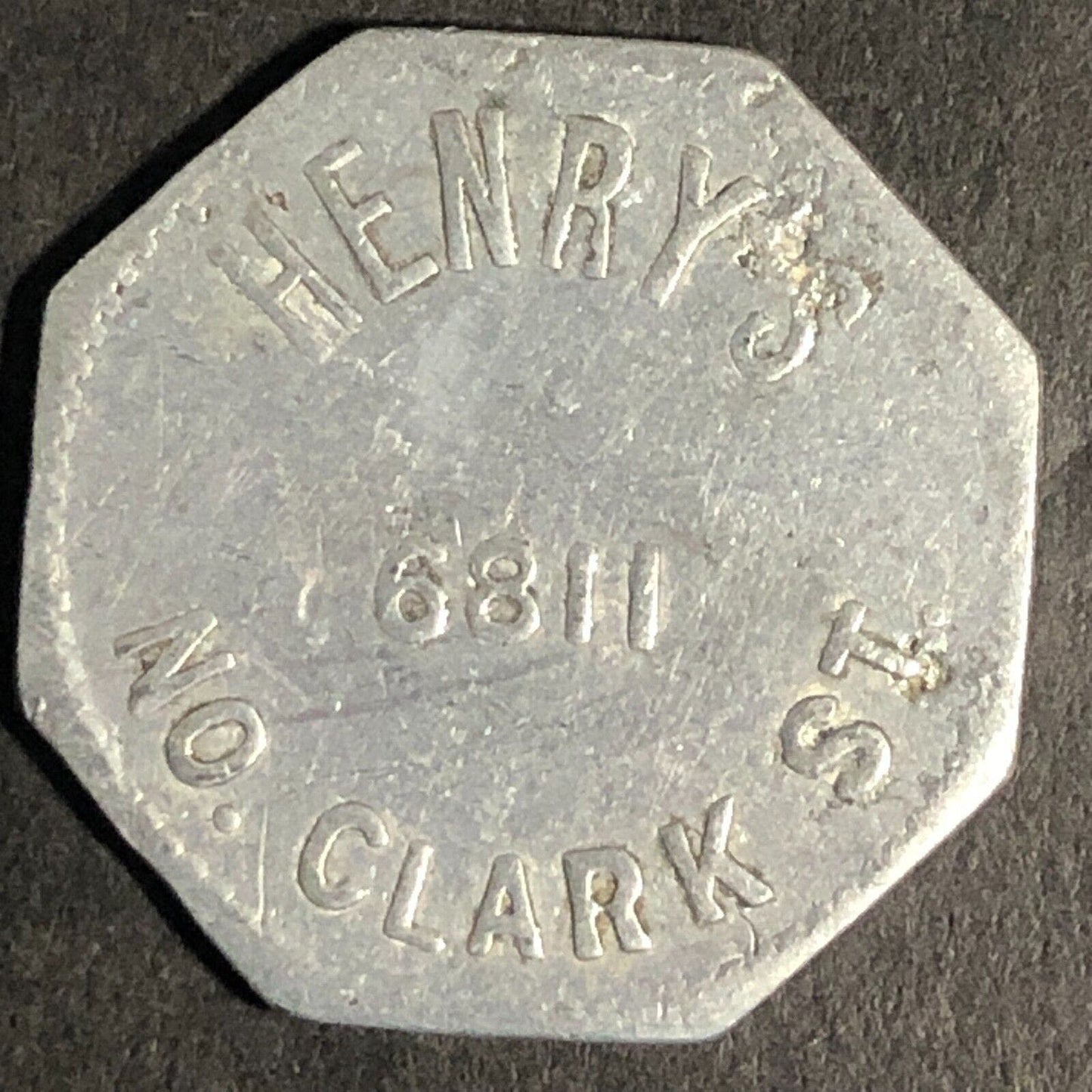 Henry's 6811 No. Clark St (Chicago, IL) Alum. G/F 25c Trade Token Hexagon - 23mm