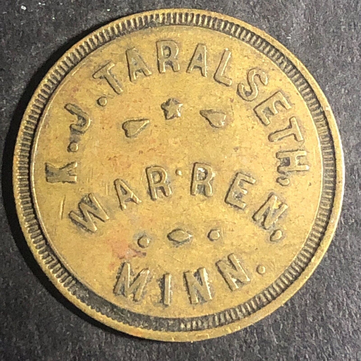 Warren, MINN K.J. Taralseth G/F 25¢ Brass Trade Token 25.7mm