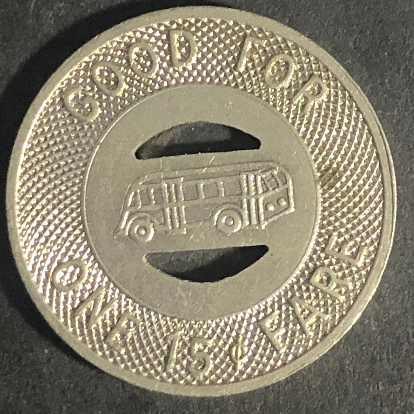 McDonald Bus Lines (Girald, OH) G/F One 15c Fare Transit WM Token 22.73mm