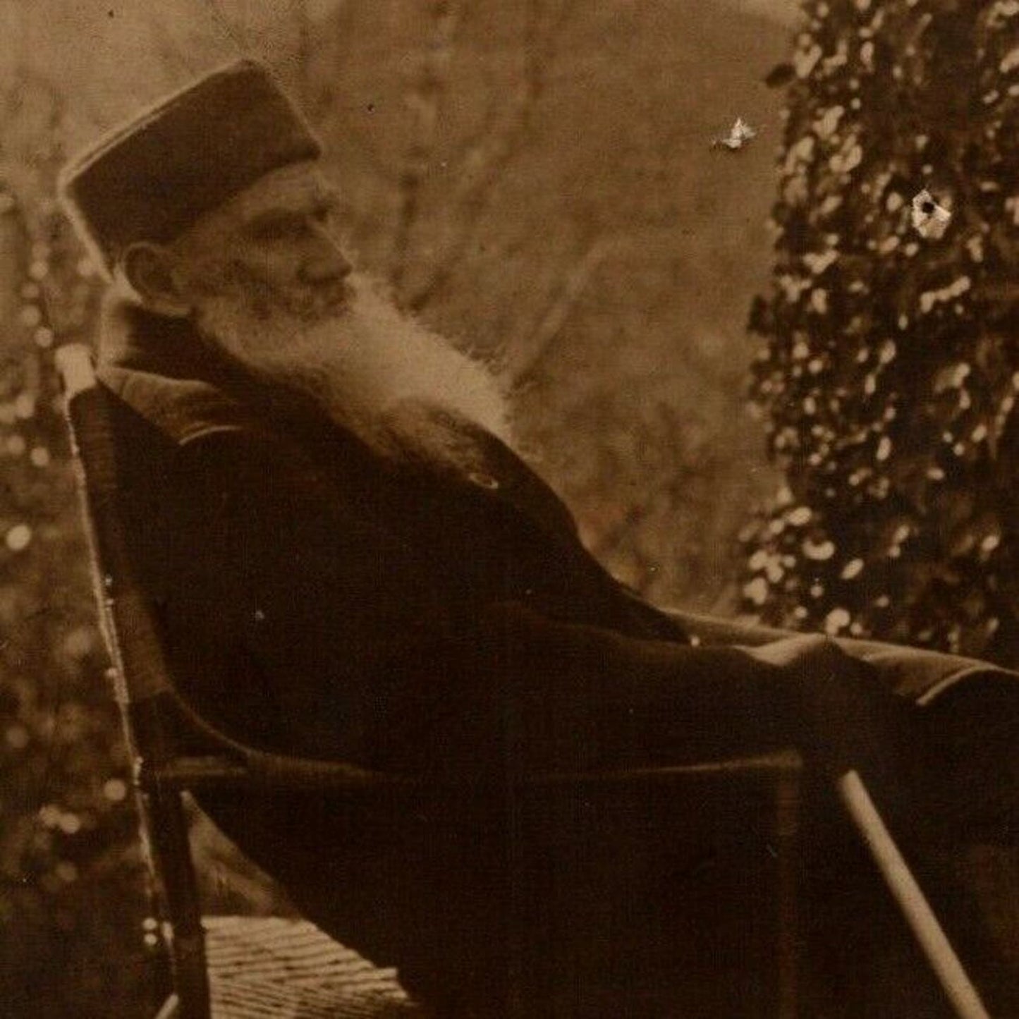 c1910 Vintage Russian RPPC* Postcard Leo Tolstoy Sitting on Outdoor Patio