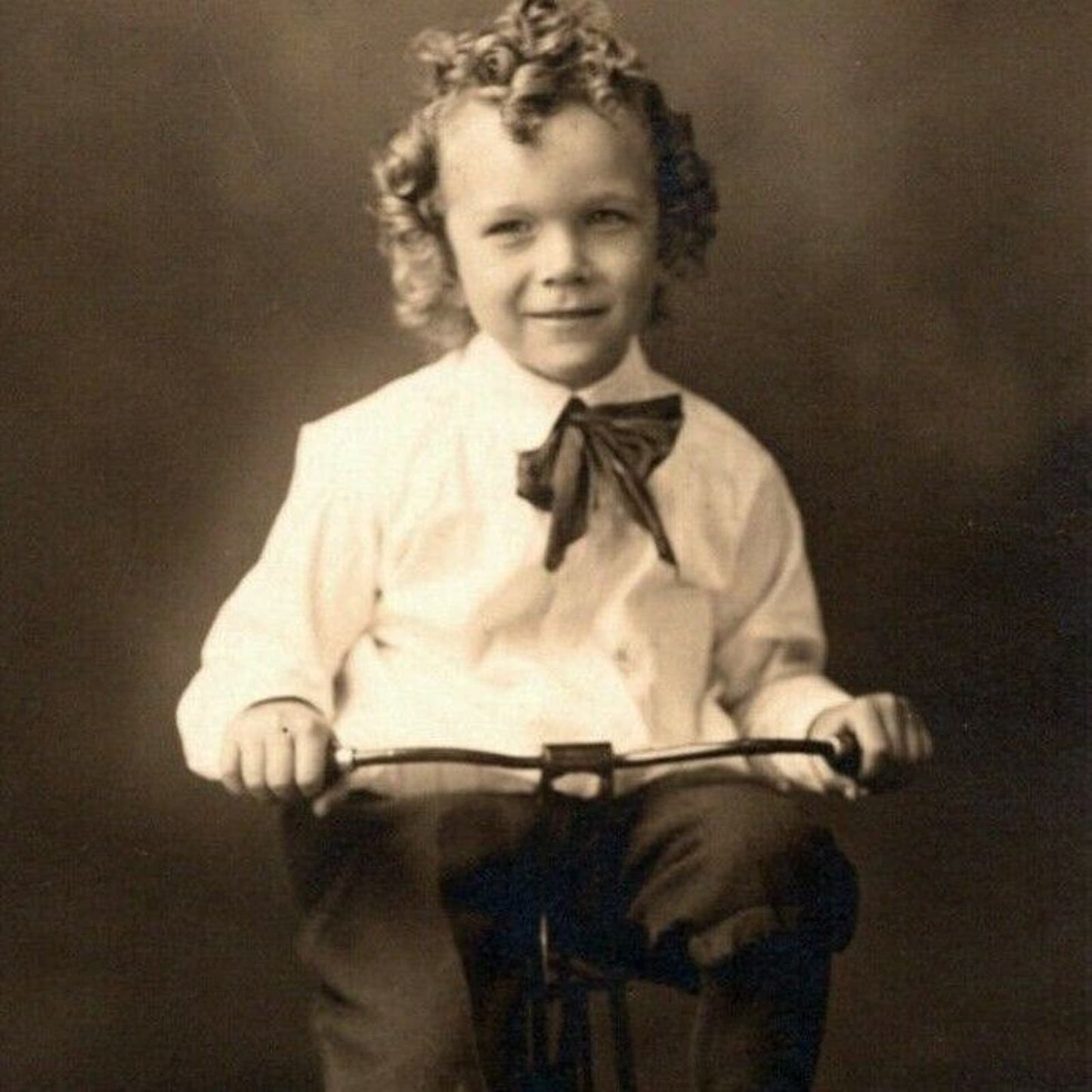Vintage RPPC Postcard c1909 Child / Girl ? Posing / Riding Bicycle / Tricycle