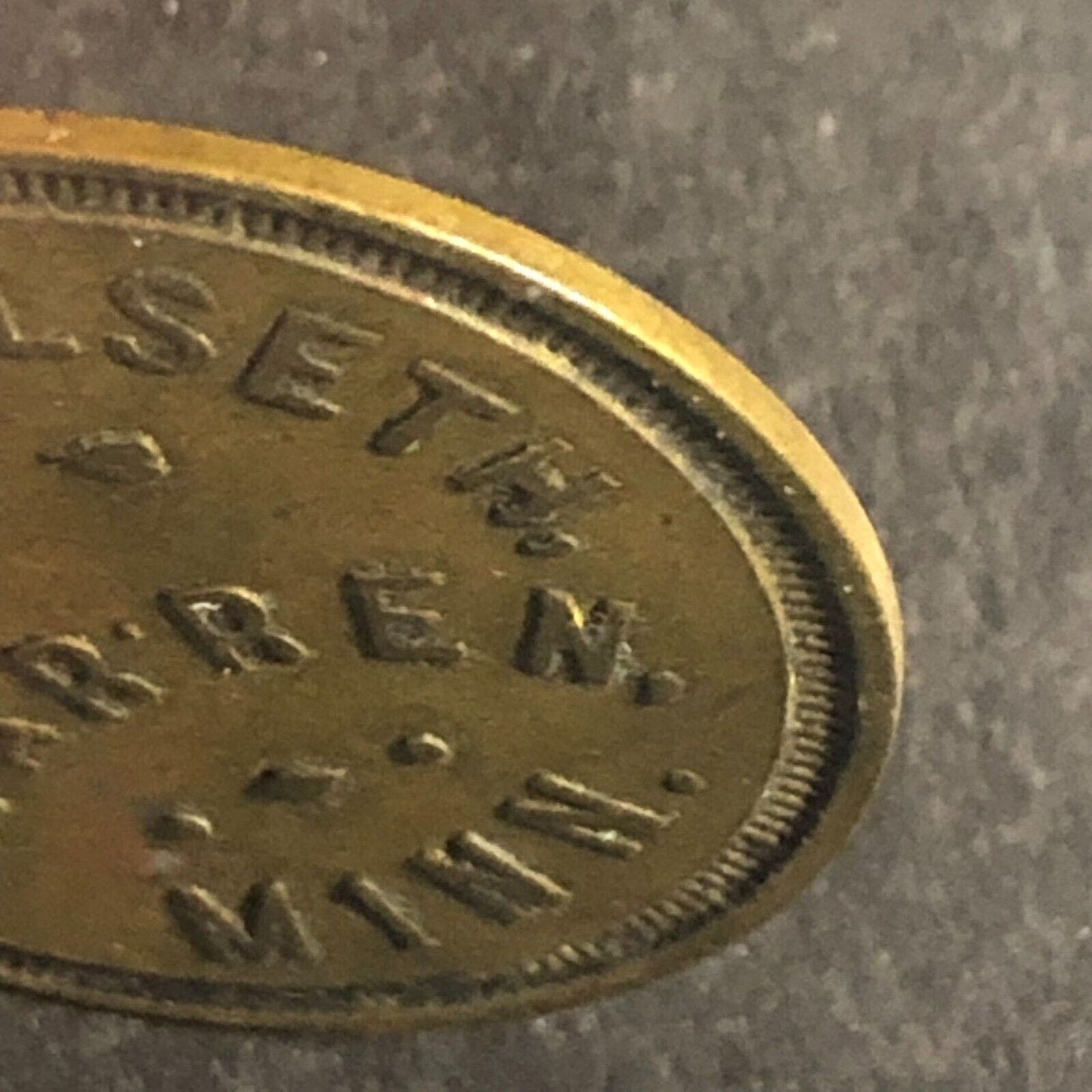 Warren, MINN K.J. Taralseth G/F 25¢ Brass Trade Token 25.7mm