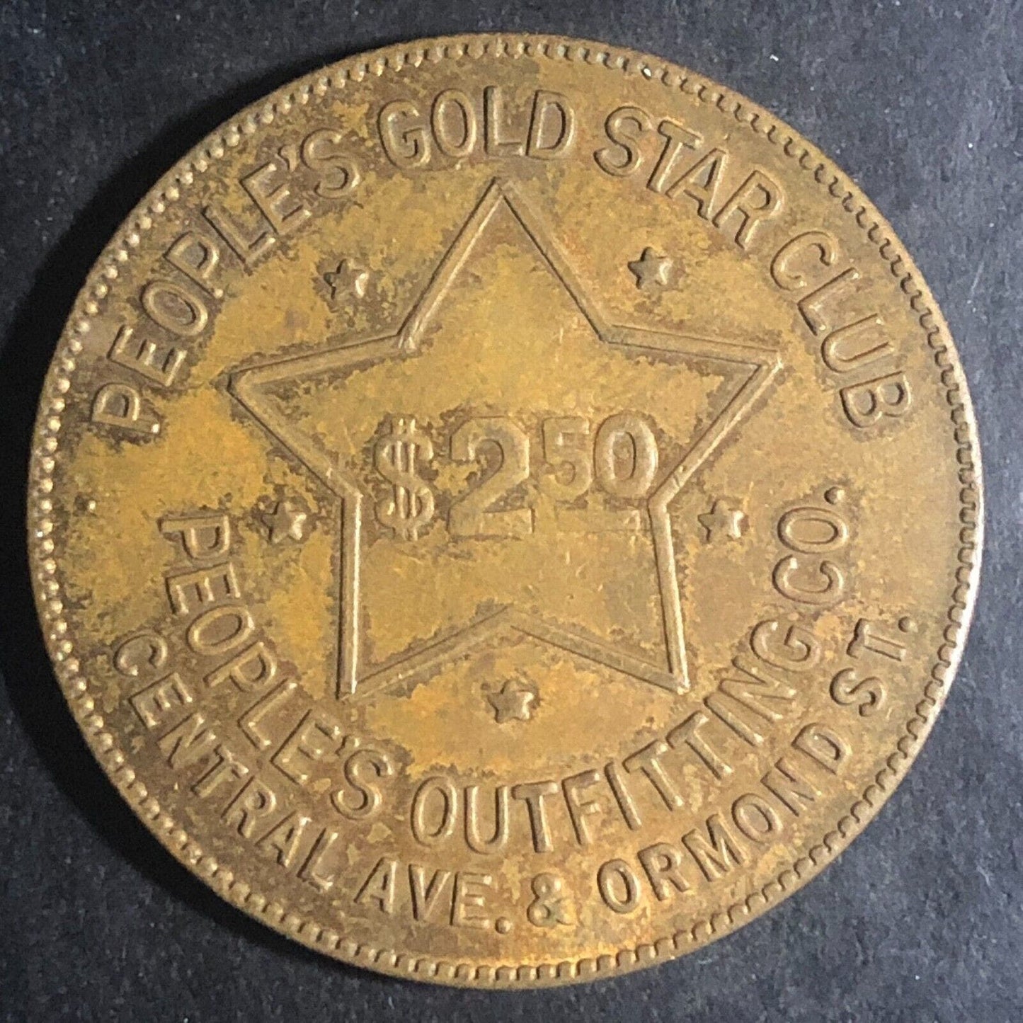 Dearborn, MI People's Outfitting Co. $2.50 Brass Token Gold Star 32mm