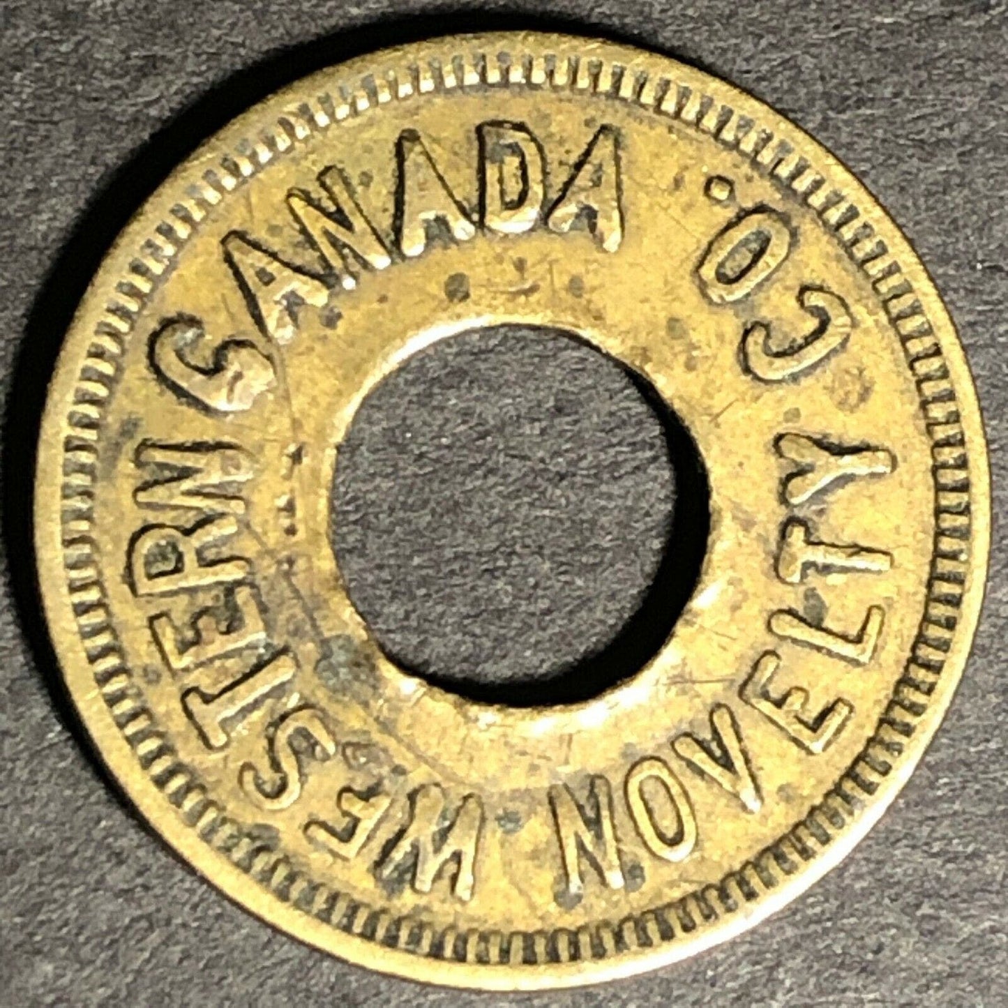 21mm c1914 Western Canada Novelty Good for 5 Cents in Trade Donut Brass Token