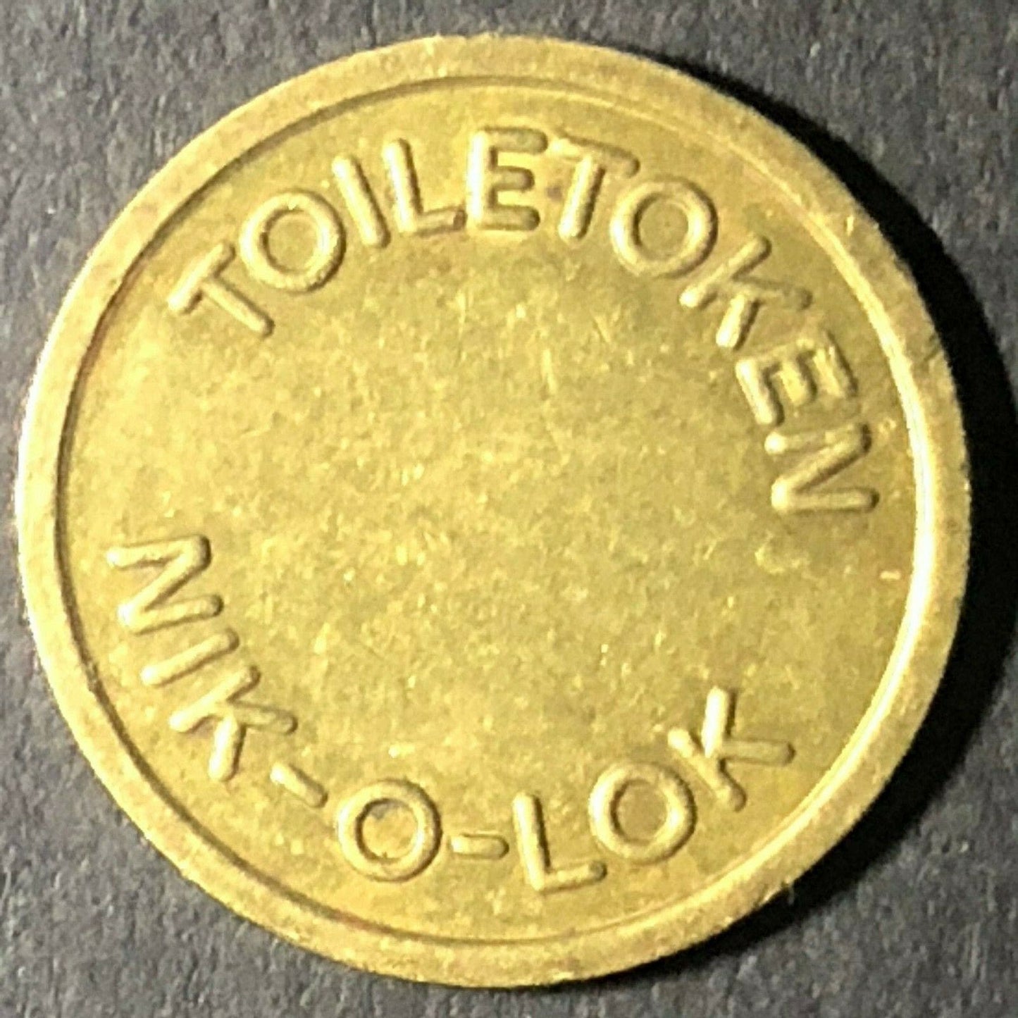 16.5mm Vintage Nik-O-Lok "Toiletoken" Brass Token - Fauver