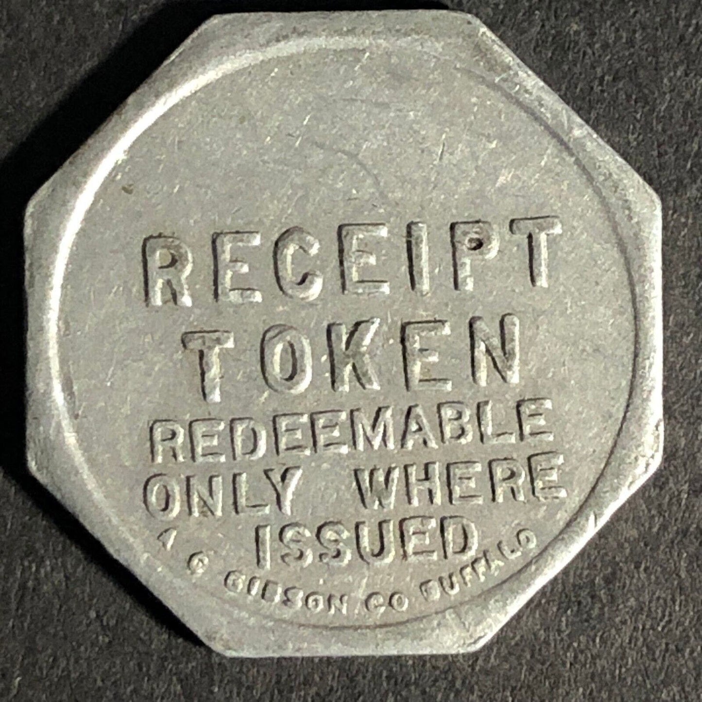 A.C. Gibson Co. 2300 Genesee St. Buffalo Alum. Receipt Token Octagon 22.61mm