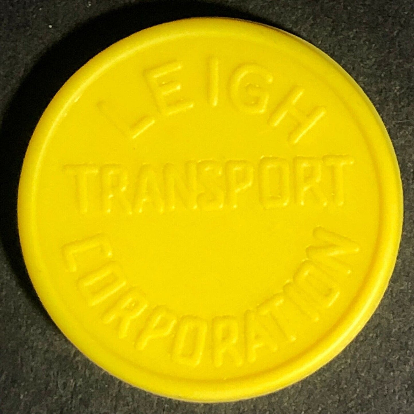 Leigh Transport England Plastic Transit Token Yellow 3D 21mm c50's-60's