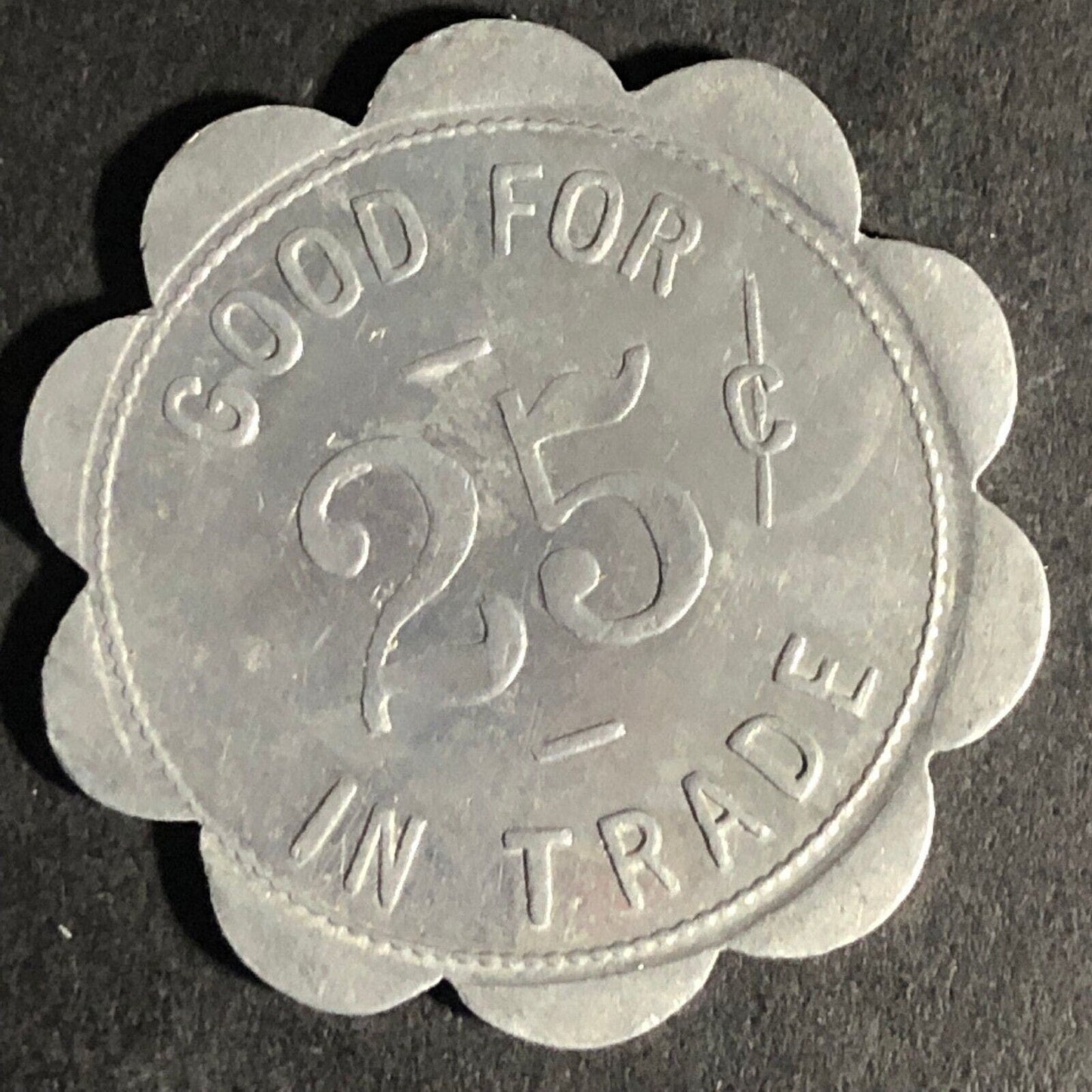 McElwain & Son Blencoe, Iowa G/F 25c Alum Scalloped Token 29.25mm Scarce