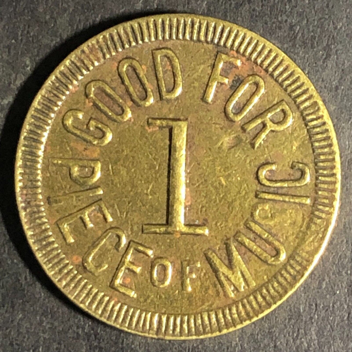 National Piano Mfg. Co. "Good For One Piece Of Music" Brass Token 21mm