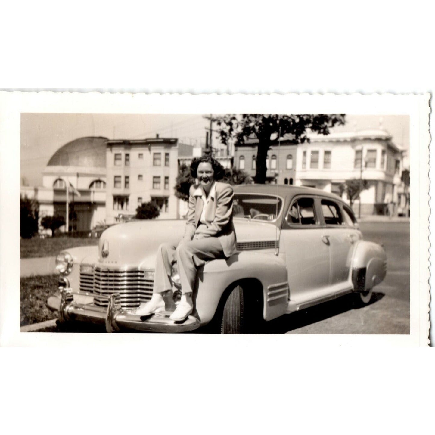 1941 B&W Photograph - Woman Sitting and Smiling on a Cadillac Series 63? VGC