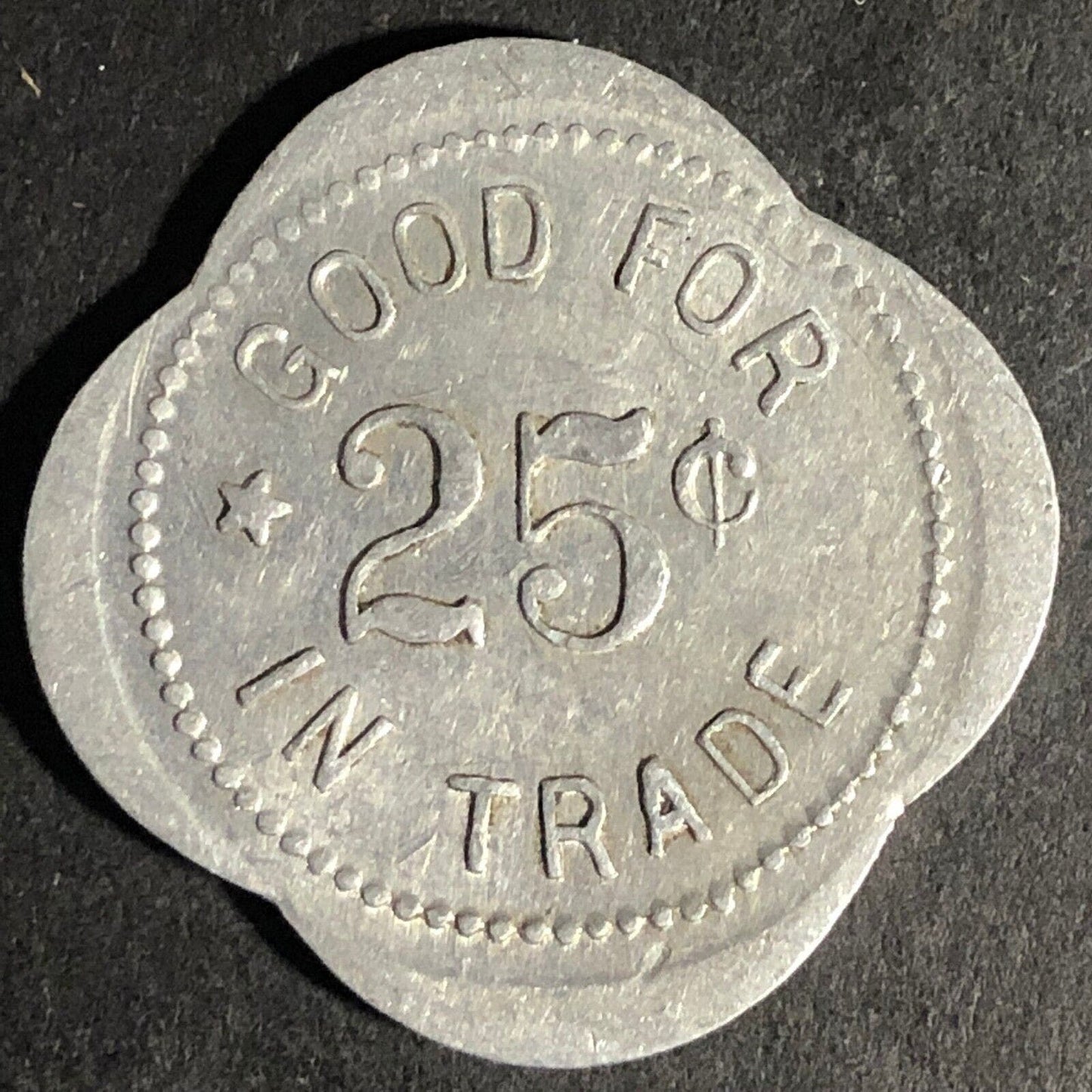 John Krier General Mdse. Iona, Minn G/F 25c Alum Scalloped Token 25.28mm Scarce