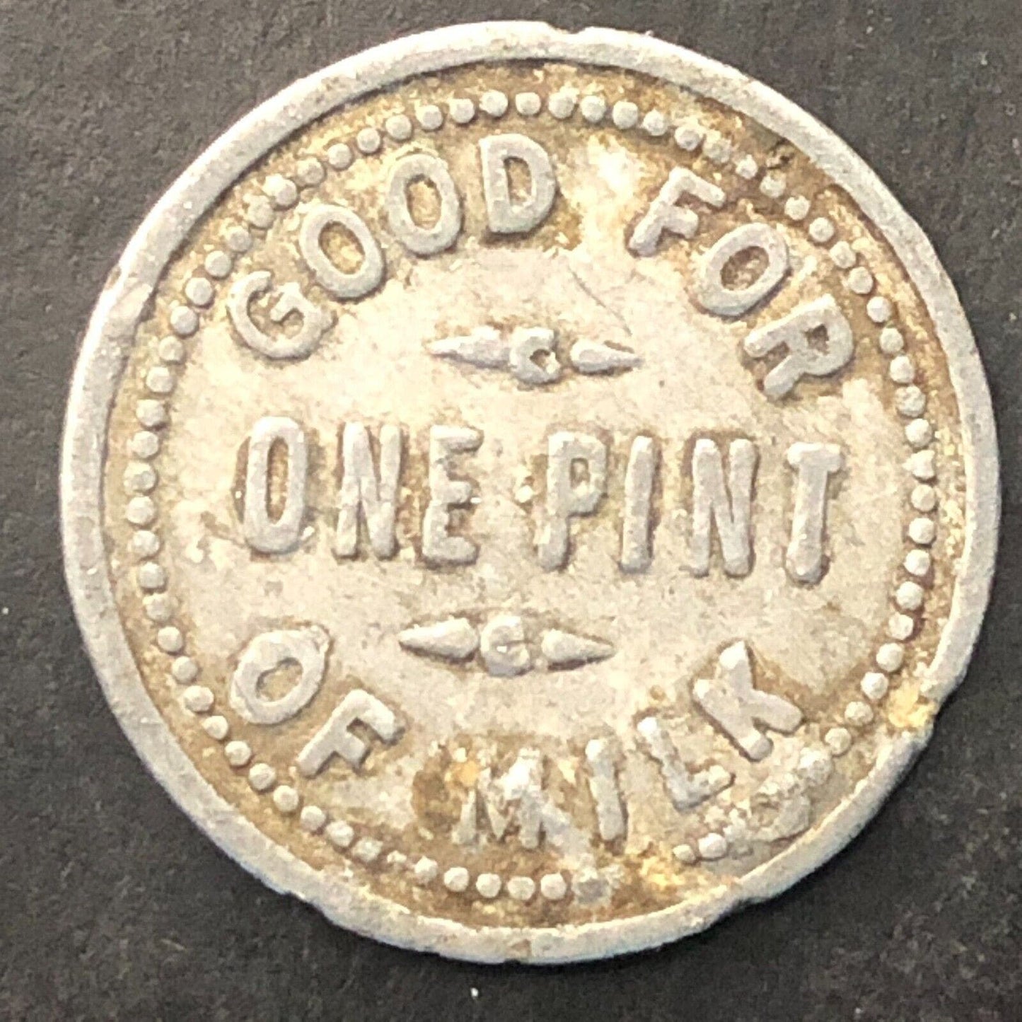 Bellingham, WA Blue Ribbon Creamery G/F One Pint Of Milk Trade Token Alum. 20mm