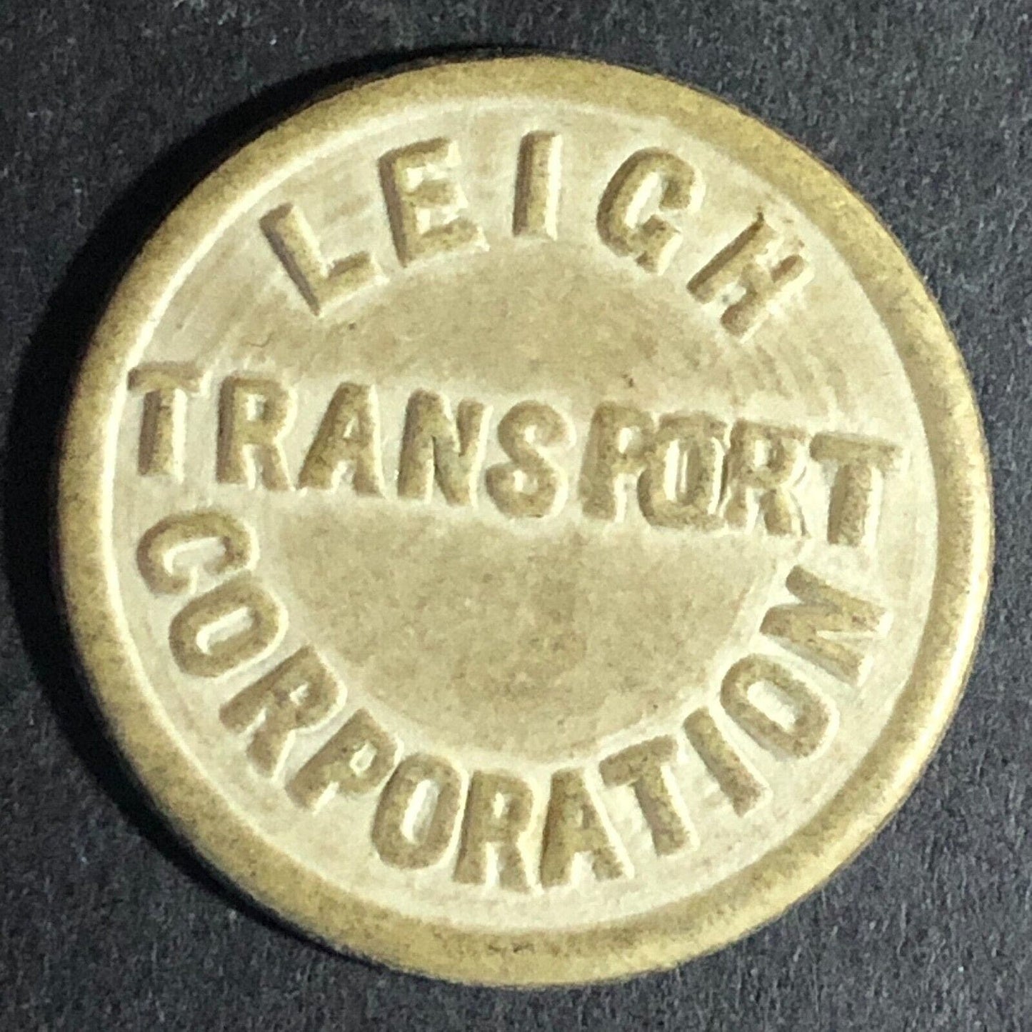 Leigh Transport Corporation 1d. Gray-ish Fiber Transit Token 25.5mm VGC Scarce