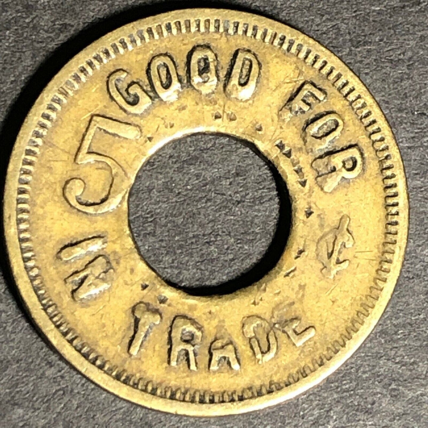 21mm c1914 Western Canada Novelty Good for 5 Cents in Trade Donut Brass Token