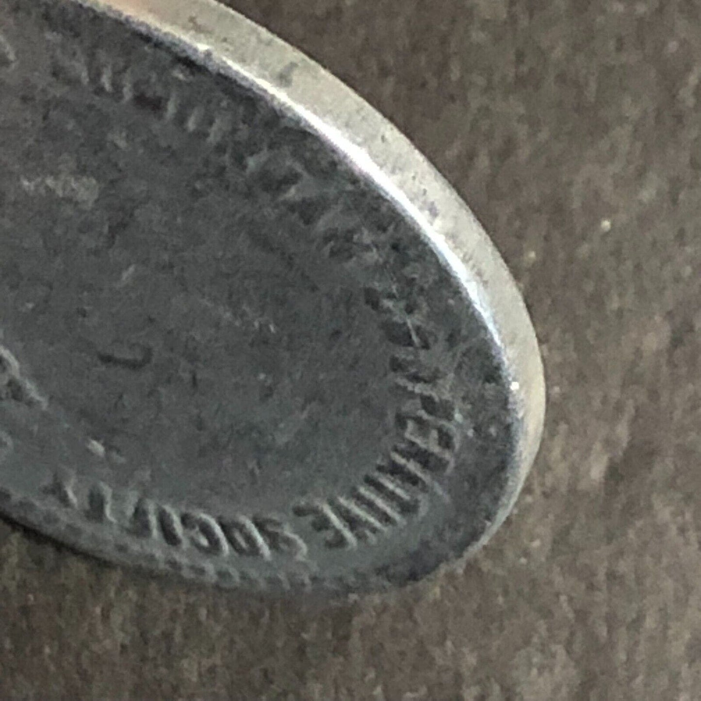 Newcastle Suburban Co-Operative Society Aluminum "Half Loaf" Bakery Token 21mm