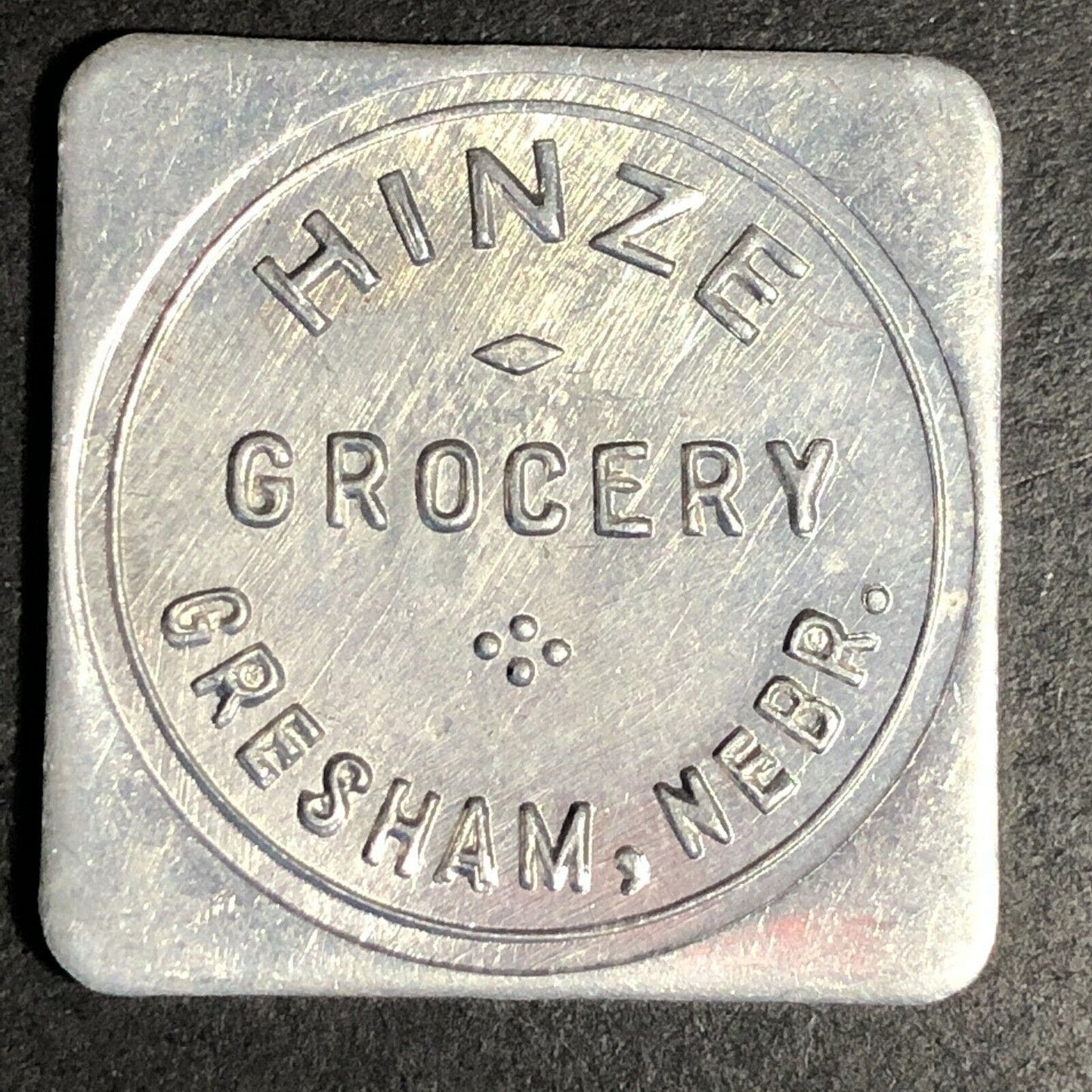 Hinze Grocery 28mm Aluminum Token "Good For 50c In Trade" Gresham, Nebraska