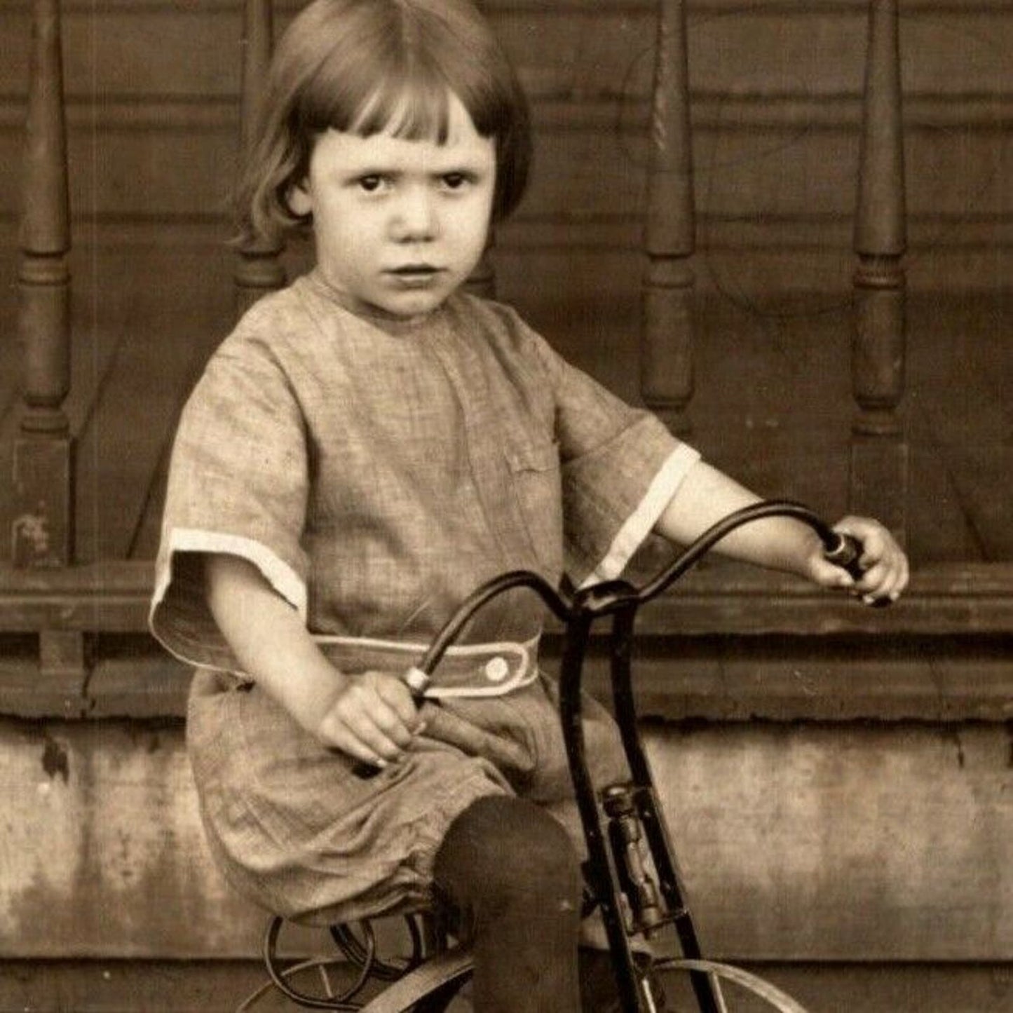 Vintage RPPC Postcard c1912 Child Near House Posing on Bicycle / Tricycle