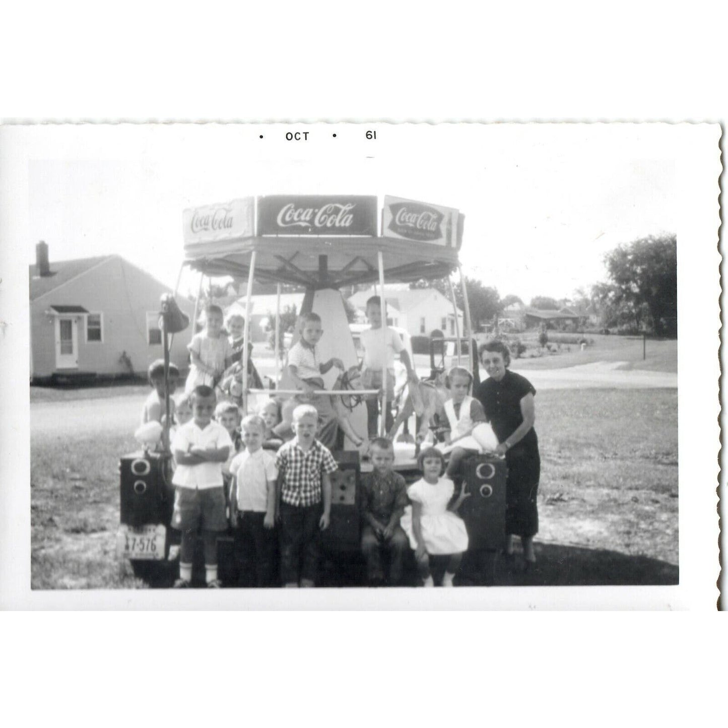 1961 Virginia B&W Photograph - Kids Pose on Portable Merry-Go-Round Coca Cola