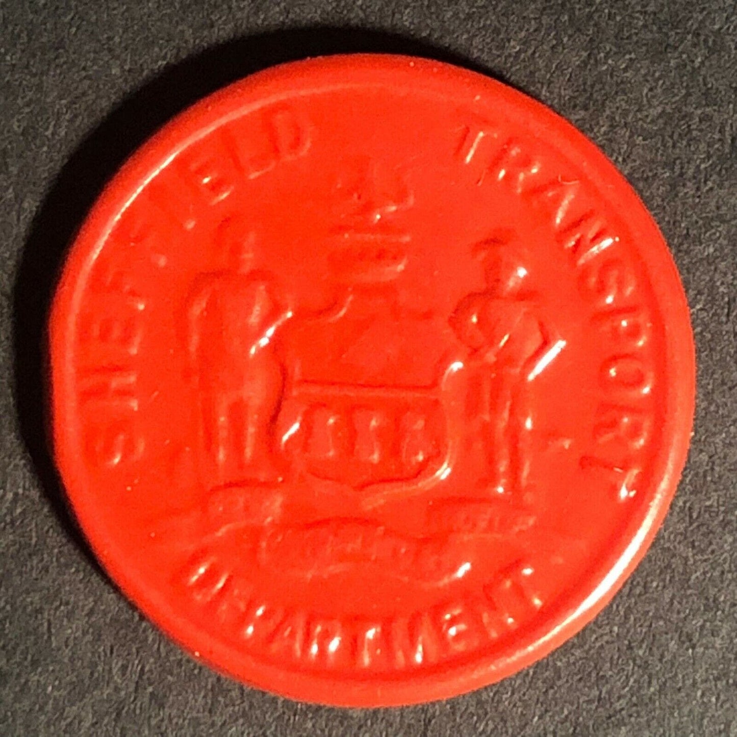 Sheffield Transport England Plastic Token Red 1D 22mm c50's-60's