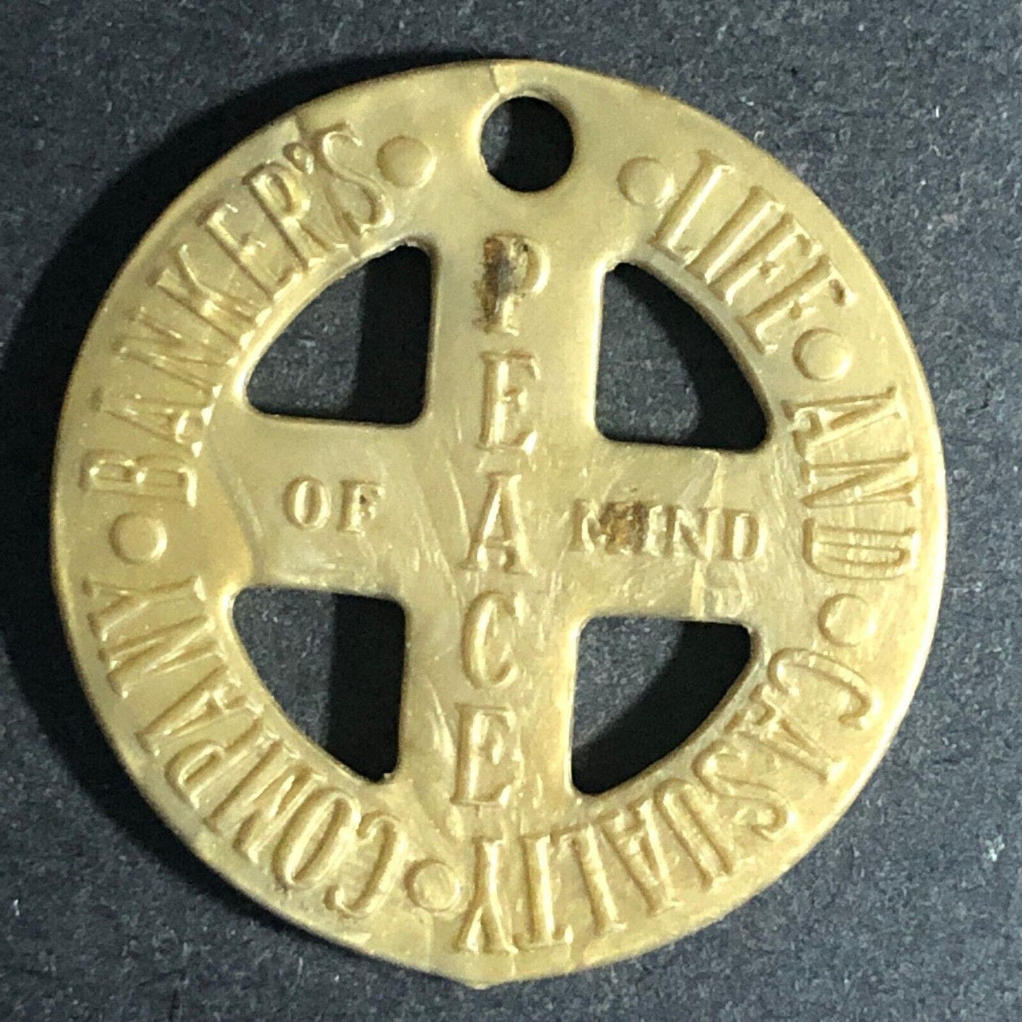 "Banker's Life and Casualty Company" (Chicago) Piece of Mind Plastic Token 26mm