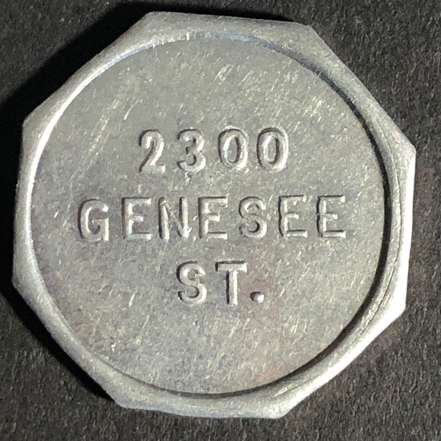 A.C. Gibson Co. 2300 Genesee St. Buffalo Alum. Receipt Token Octagon 22.58mm