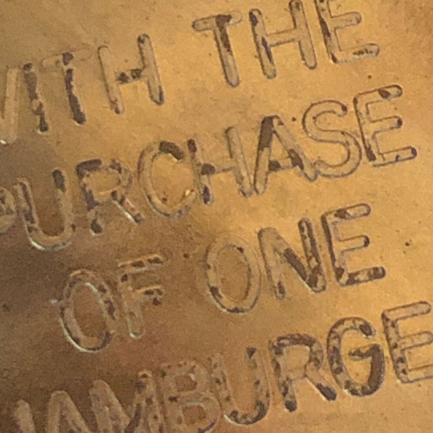 39.50mm Nesbitts "Free Fountain Orange Drink w/ Purchase Of One Hamburger" Token