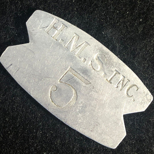 H.M.S. Inc. 5 (H. M. Stevens - Churchill Downs) Alum. "Fishtail" Token 22mm x 38