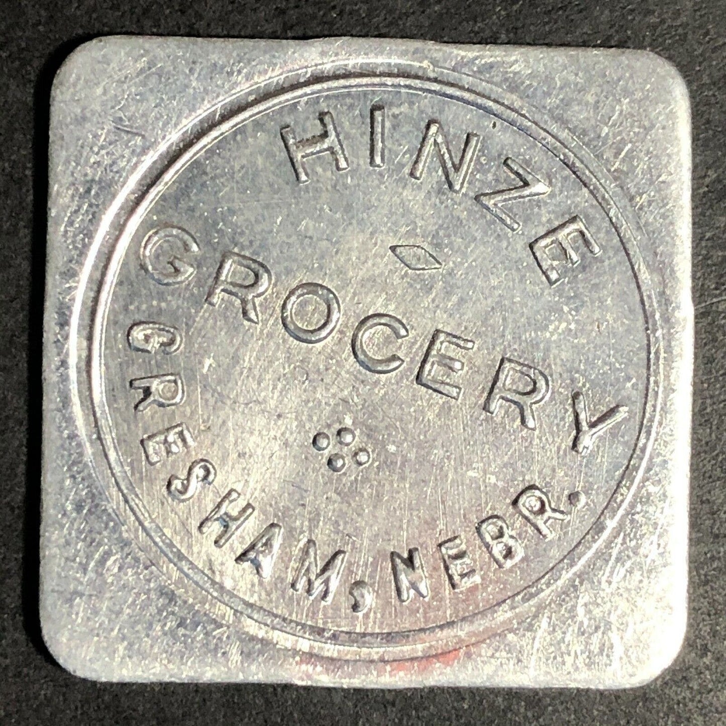 Hinze Grocery 31mm Aluminum Token "Good For $1.00 In Trade" Gresham, Nebraska