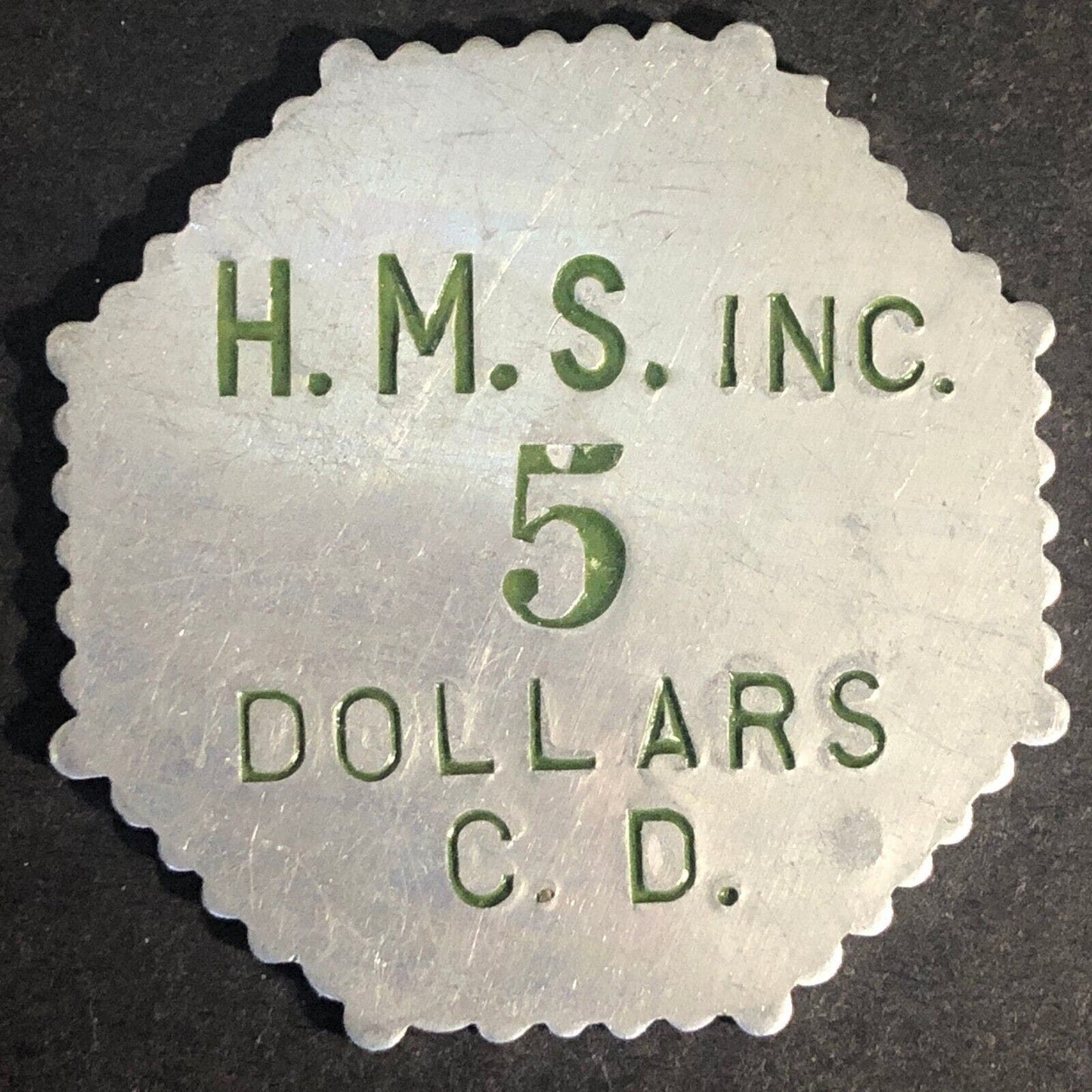 H.M.S. Inc. 5 Dollars C.D. (H. M. Stevens Churchill Downs) Alum. Token 37mm