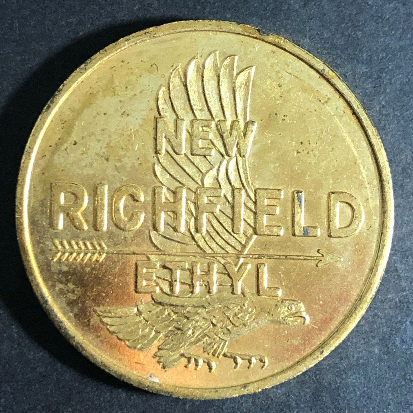 Vintage 38mm c1940's "New Richfield Ethyl" - Brass Spinner Token
