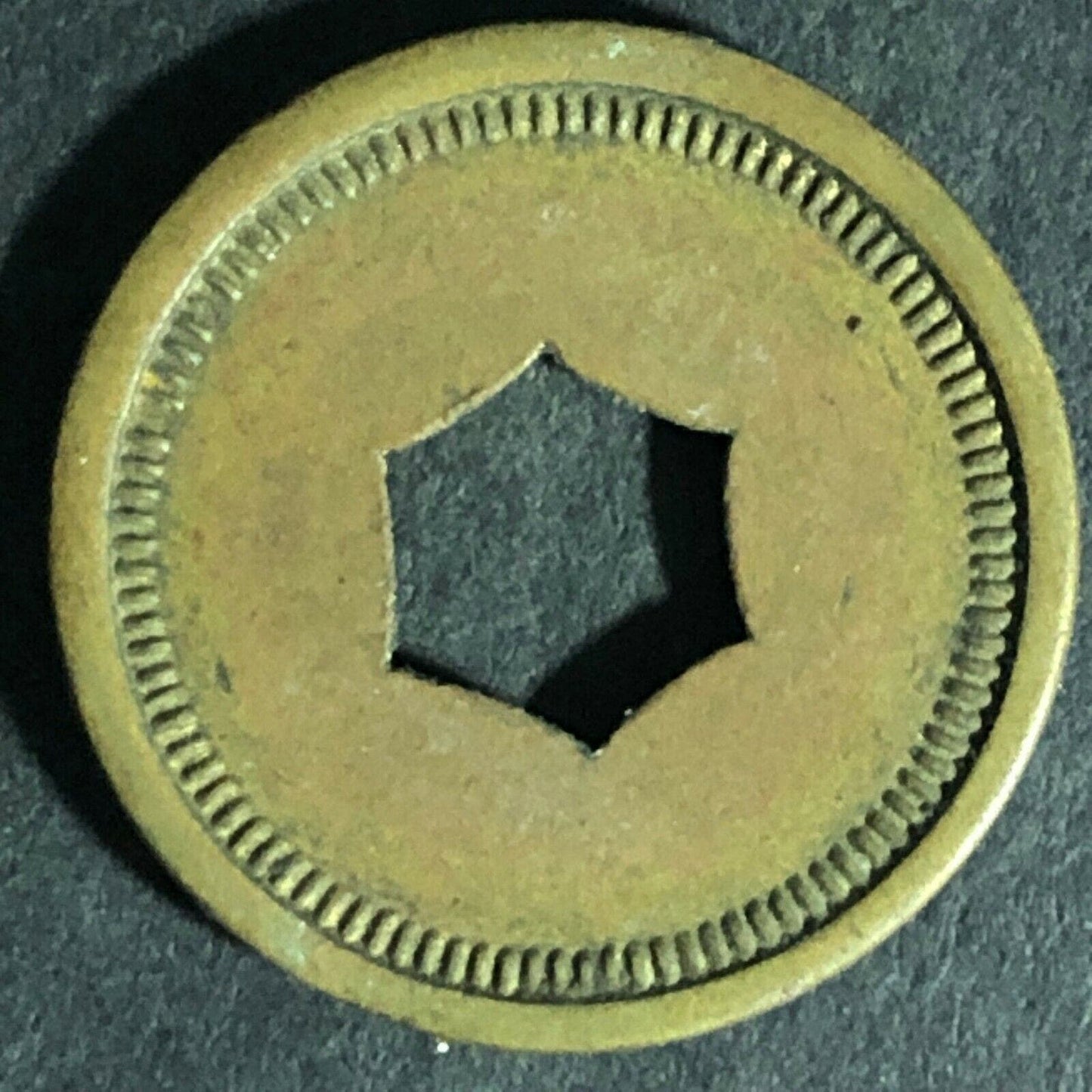 "Good For 5c Package Fruit Gum" Token (Watling Mfg. Chicago) Hexagon Cut 21.3mm