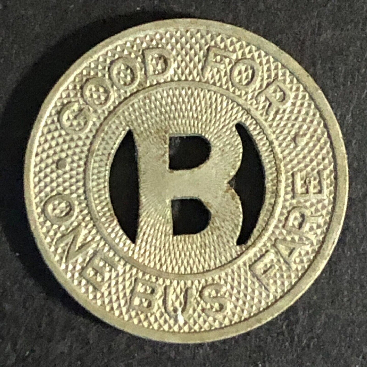 Capitol Bus Line (Bismarck, ND) WM G/F One Bus Fare Transit Token -- 20mm