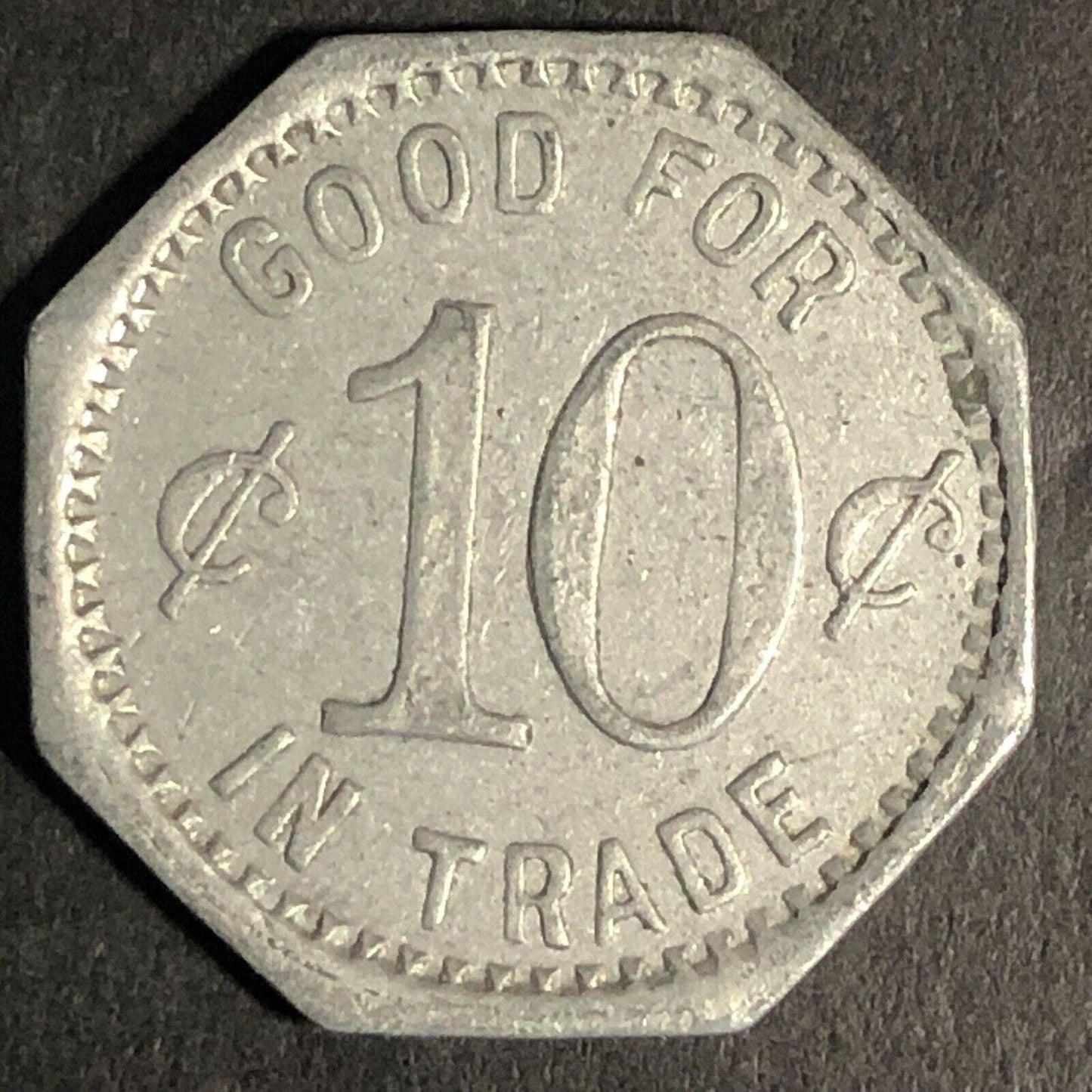 Henry's 6811 No. Clark St (Chicago) Alum G/F 10c Trade Token Hexagon 23mm